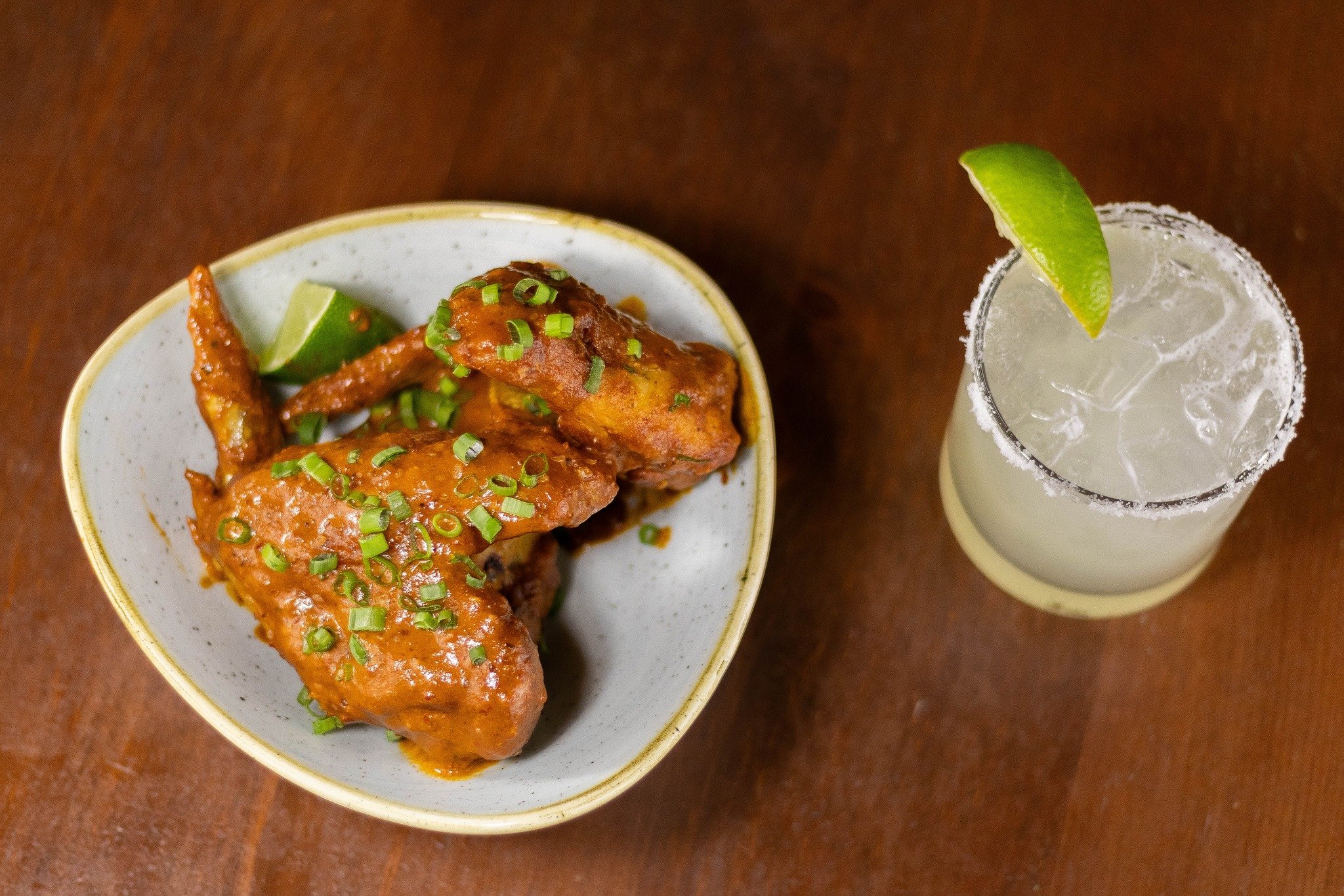 Wings + Margaritas = pure bliss. New on happy hour &ndash; our salsa macha wings are BACK. Spicy, nutty &amp; a little bit sweet... these are addictingly good. 🍗

🙂 Edina: M-F 3-6 PM
🙂 St. Paul: M-T 4-6 PM, W-F 3-6 PM

If you miss happy hour don't