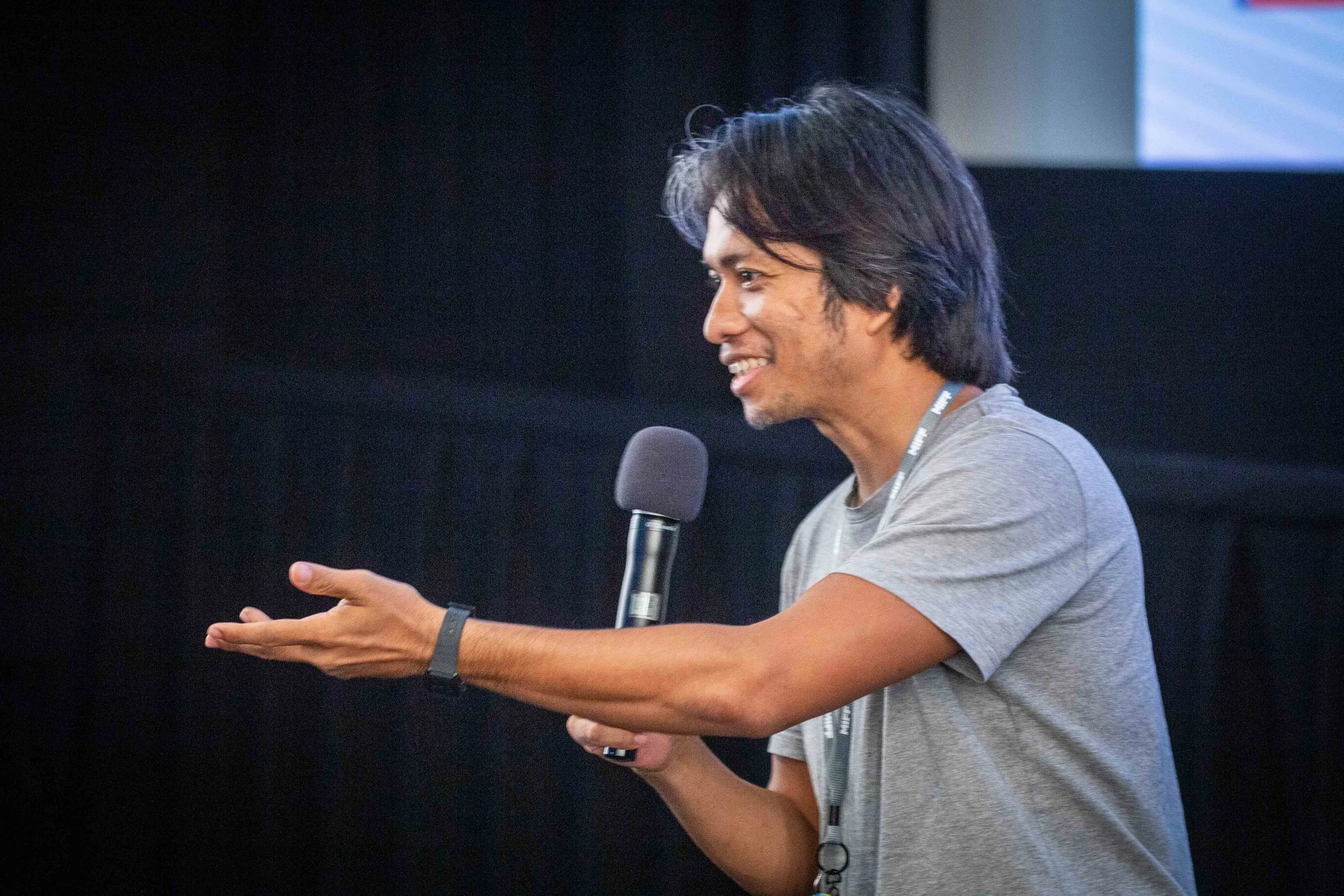 Cambodian filmmaker Kavich Neang speaks to audiences following his film "Last Night I Saw You Smiling" at MIFF28.