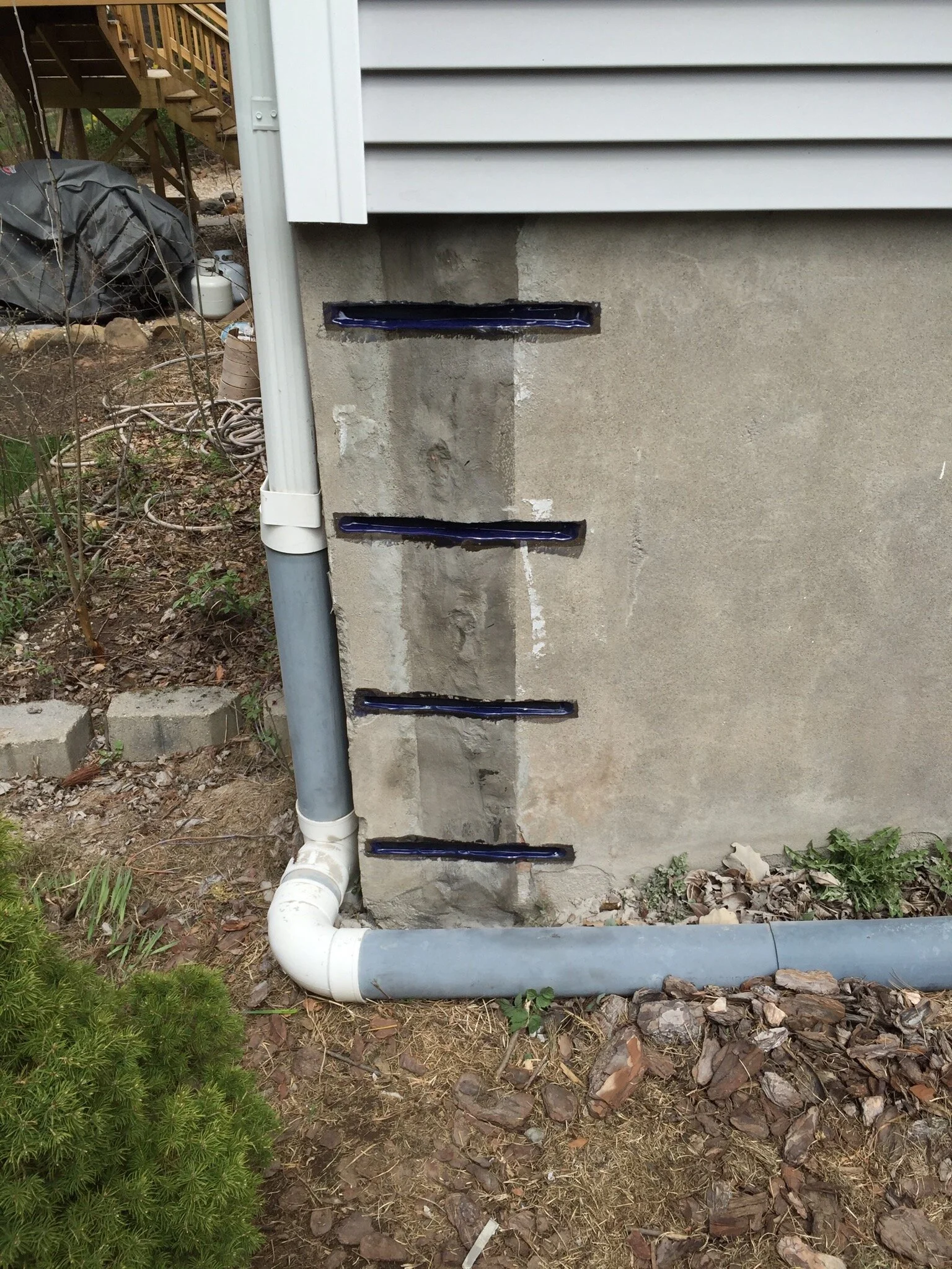 Structural crack with epoxy and carbon fiber staples in progress