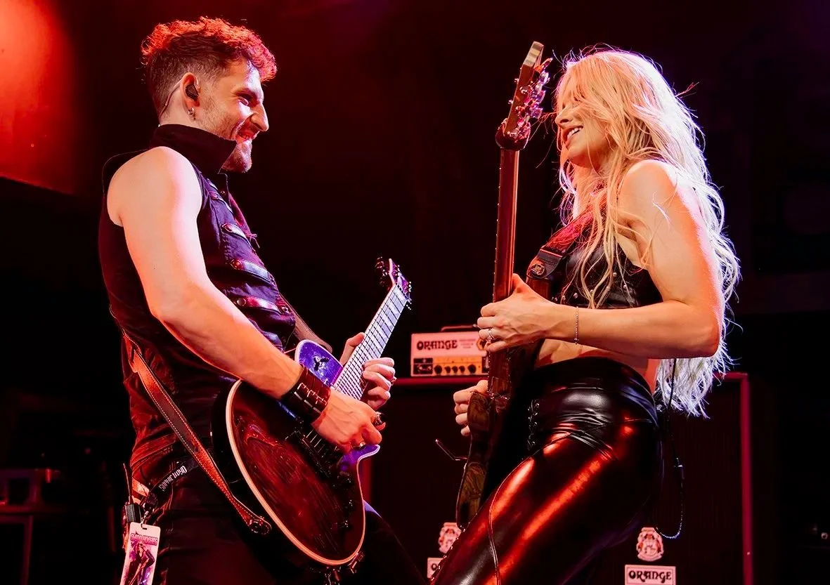 Professional guitarist Christian Rivers performing live with Sophie Lloyd.