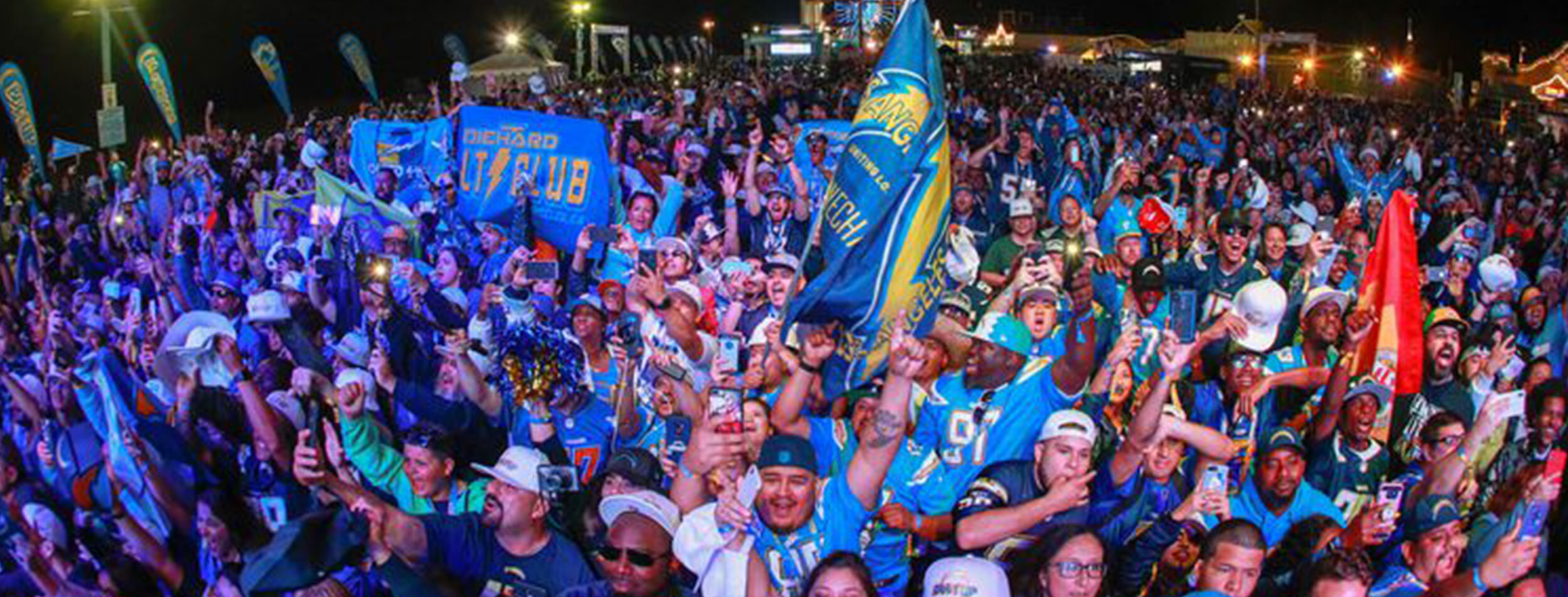 Group of people celebrating football watch party