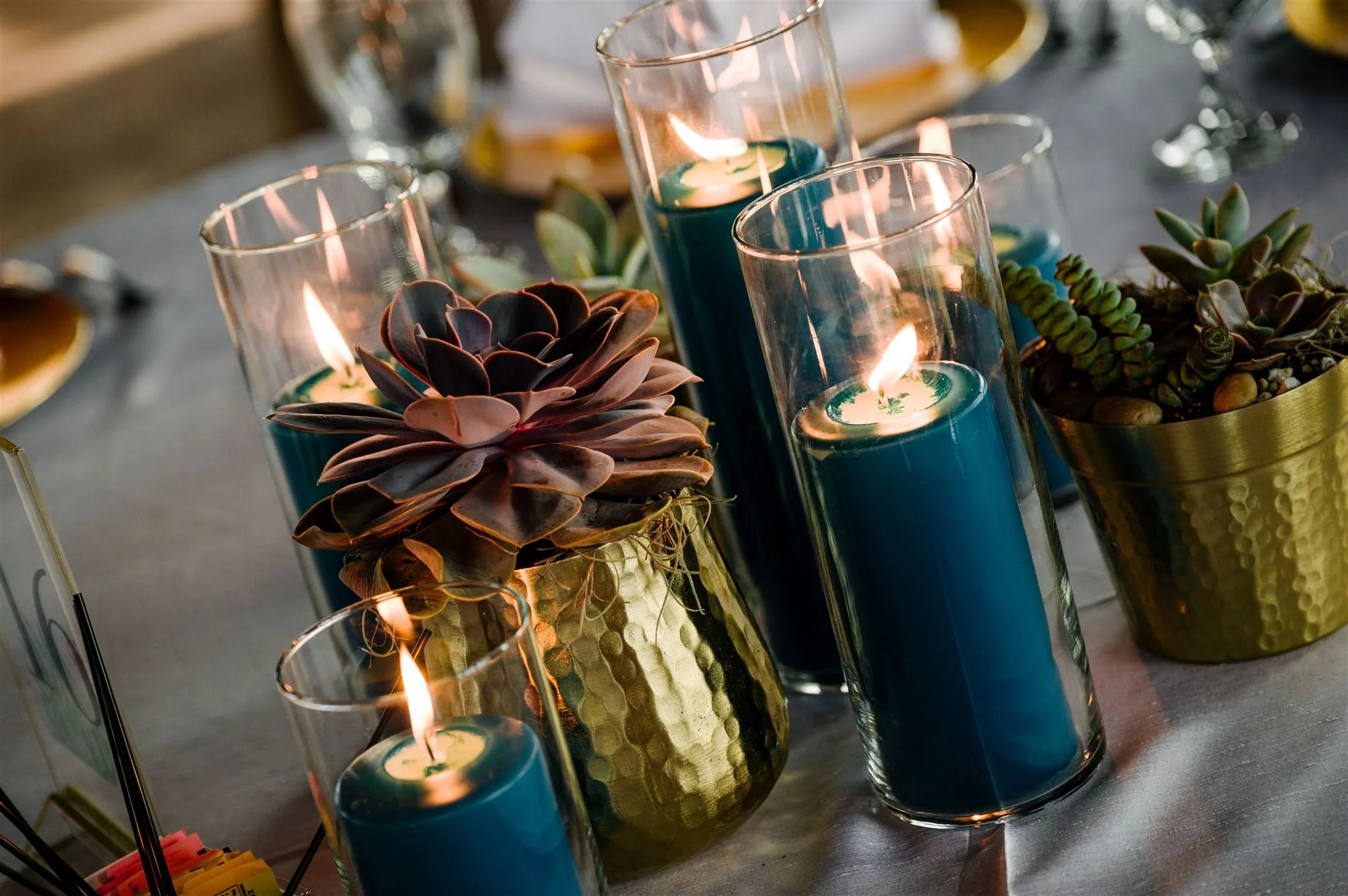 Blue candles and succulent centerpiece