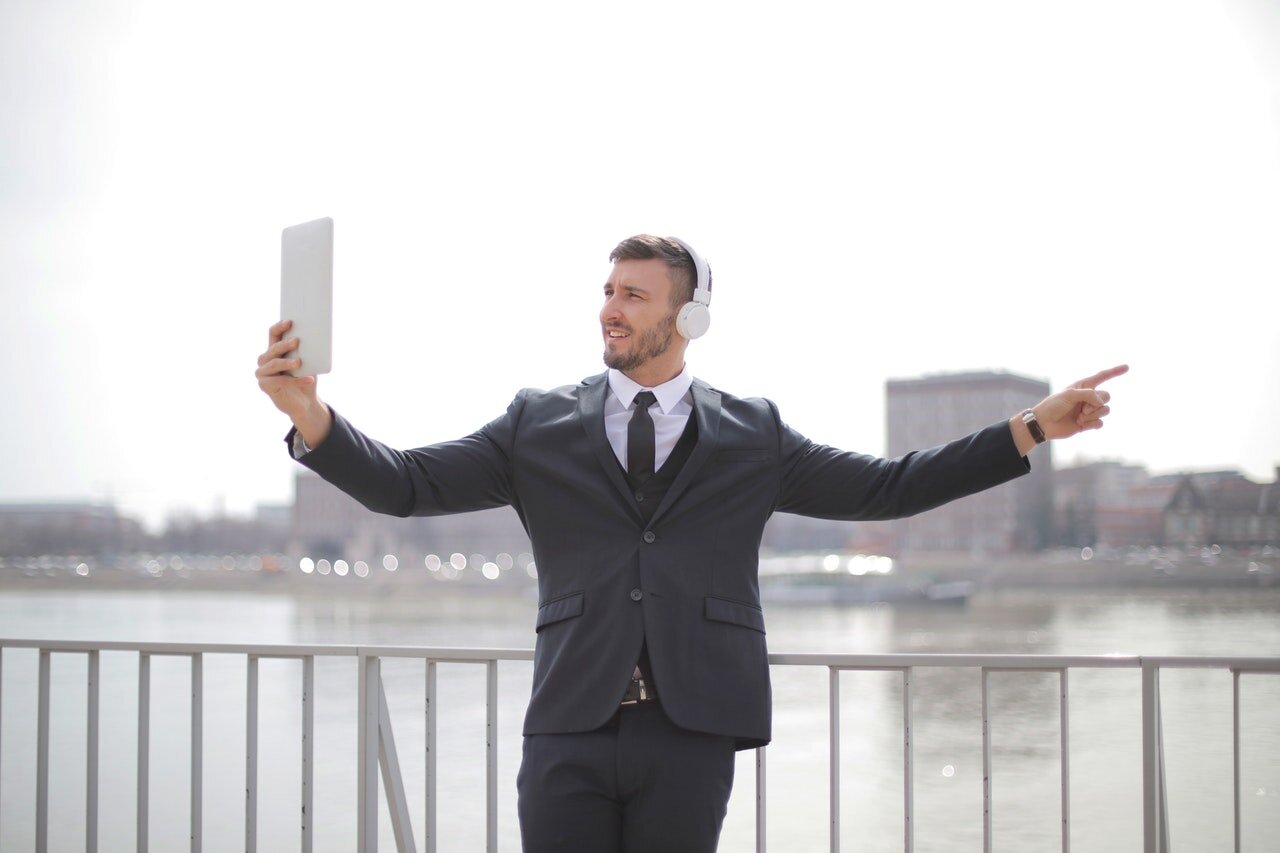 man-in-black-suit-jacket-and-black-pants-standing-near-the-3778859.jpg