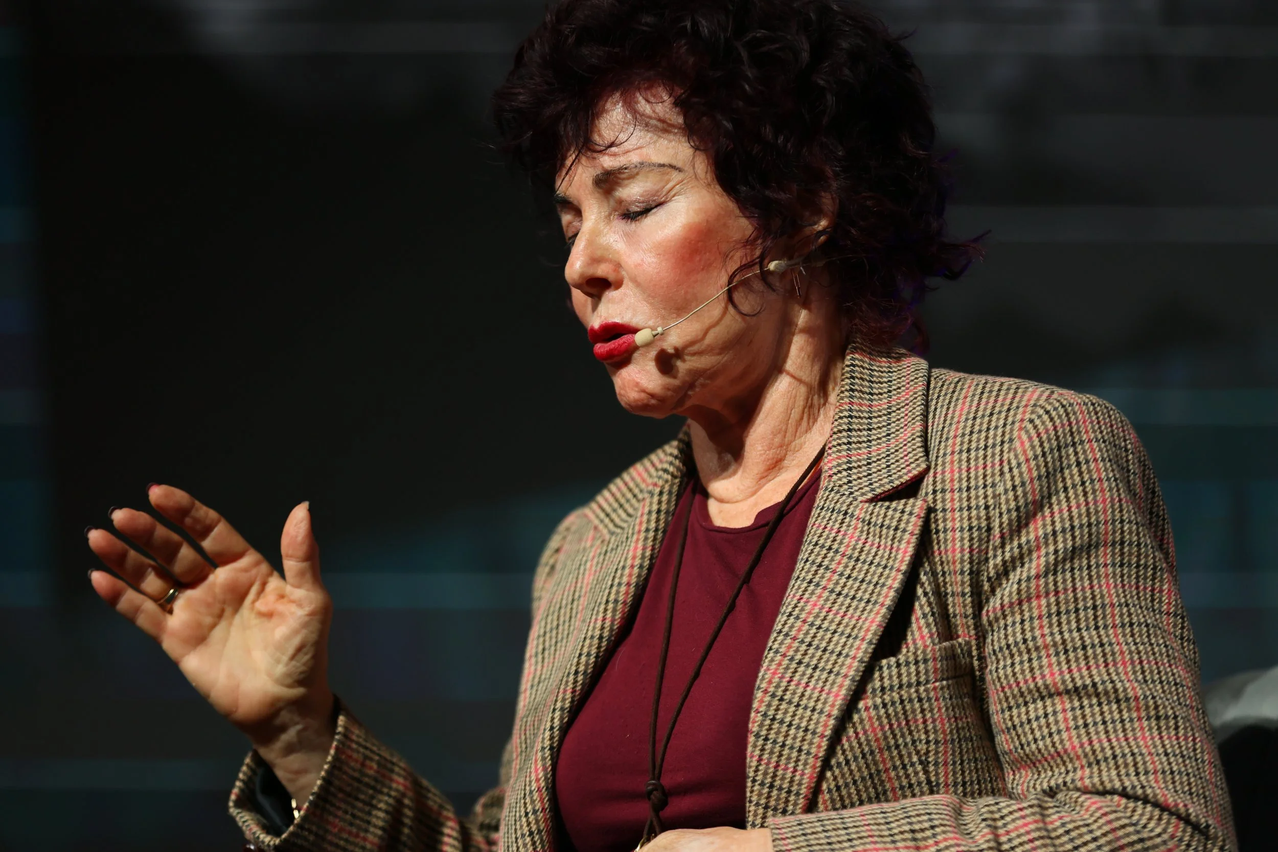 Image of mindfullness speaker conducting a meditation practice at Talent Summit