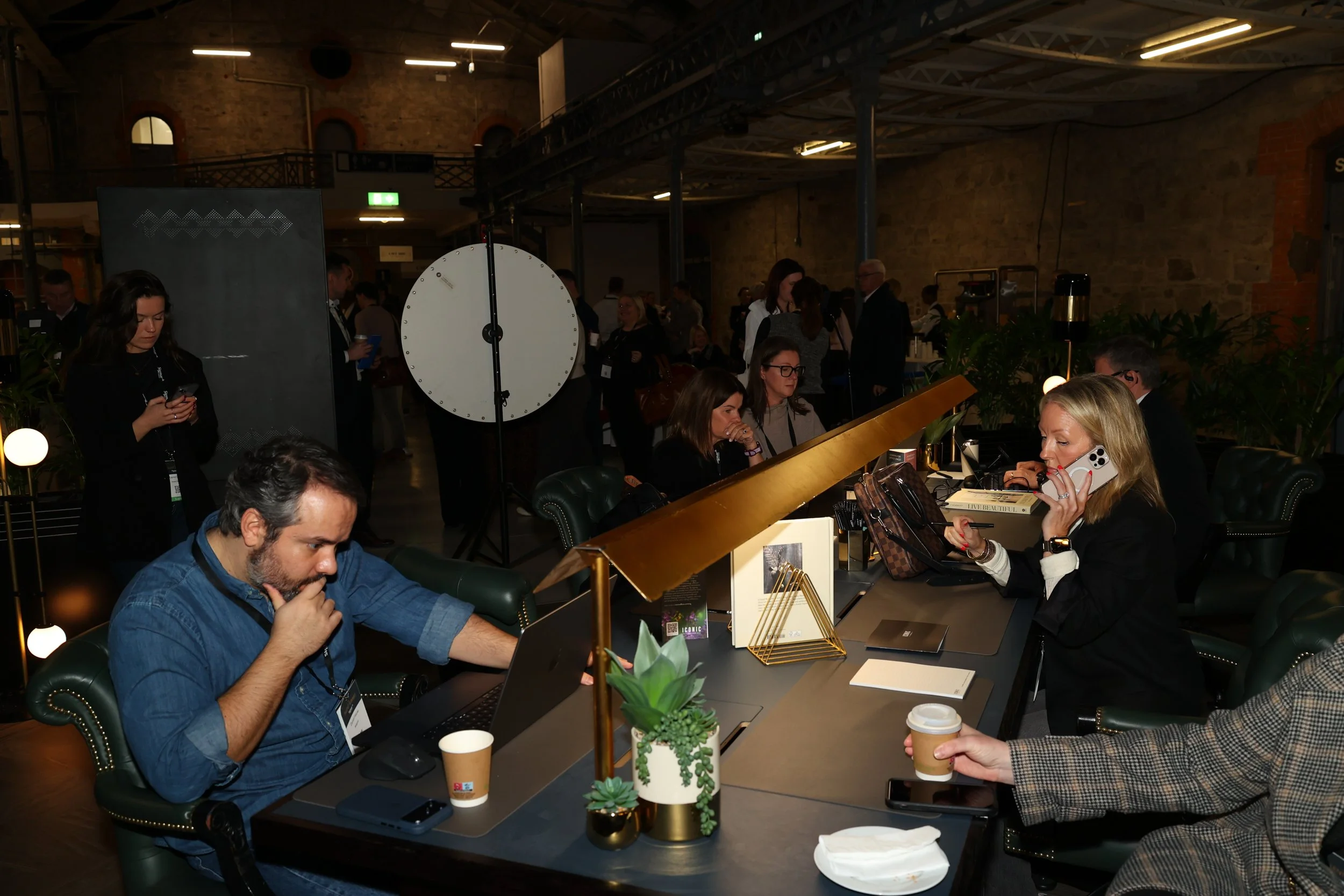 HR professionals at Talent Summit Dublin use the office spaces provided to get some work done between talks.