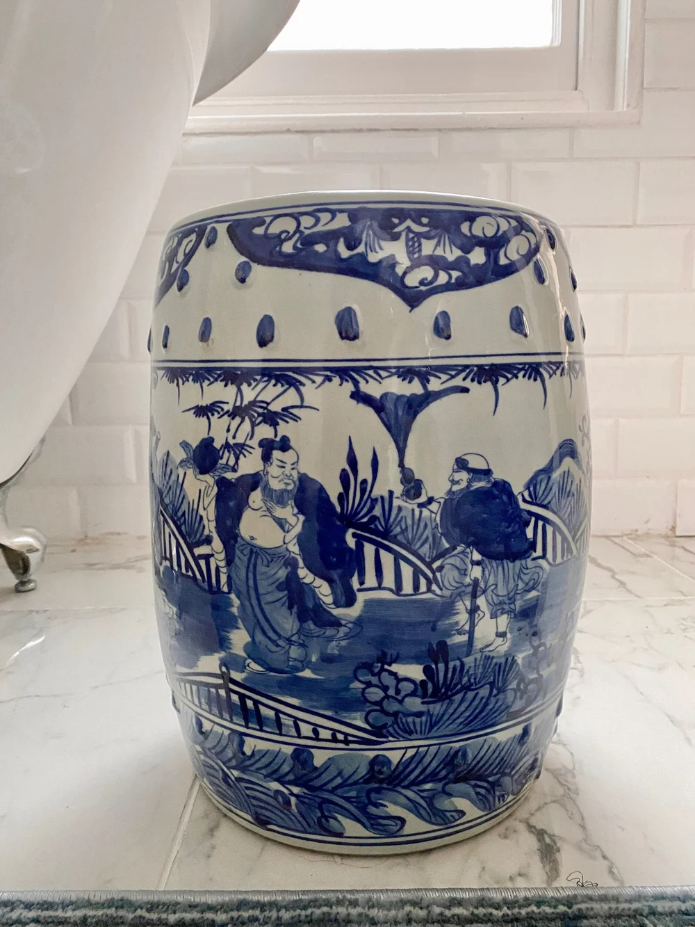 Blue and white chinoiserie ceramic stool men motif relic interiors