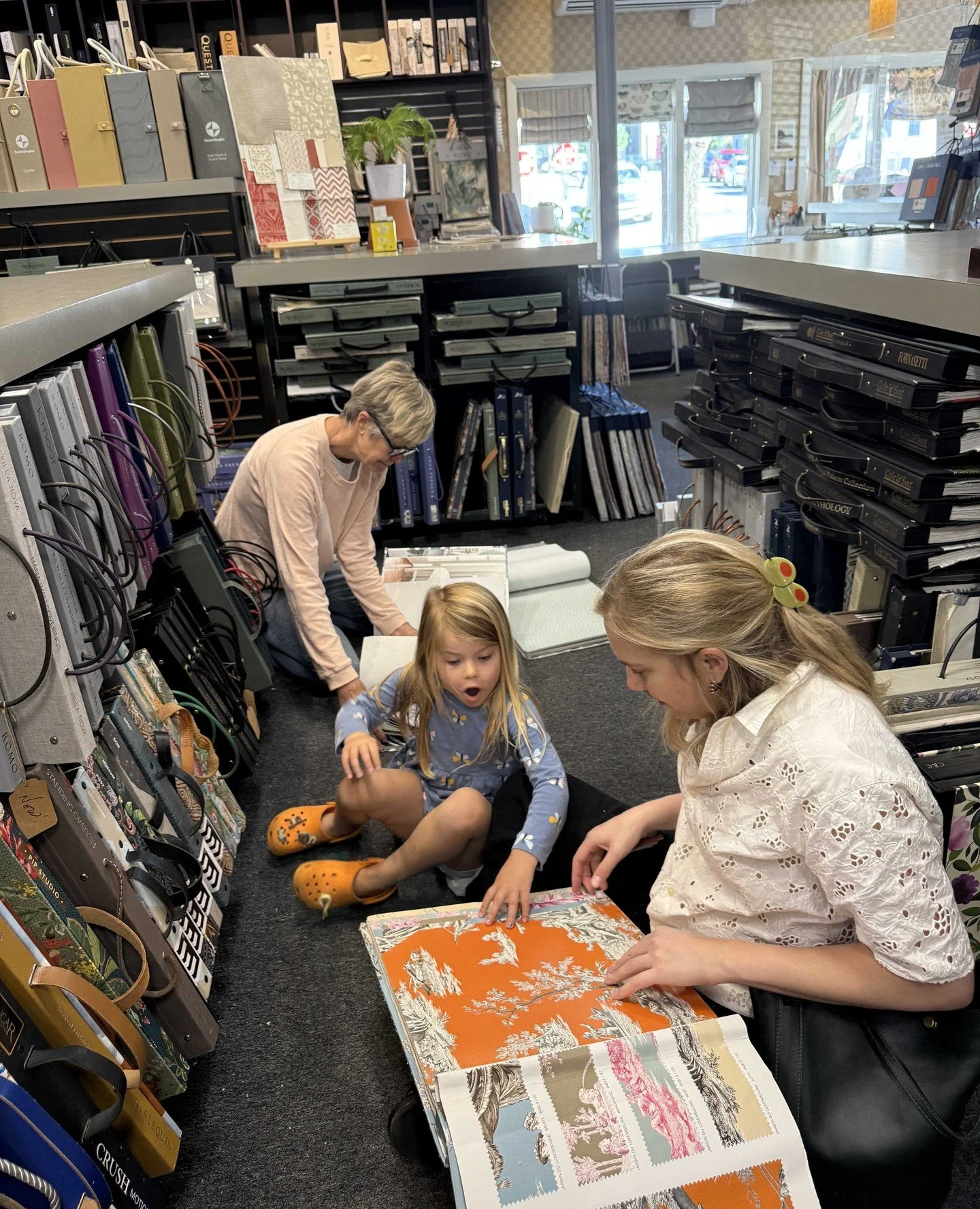 Three generations exploring the wonderful world of wallpaper! Her face says it all -- every wallpaper is on sale through October 31st! 😲 ▶️adlersri.com/october-sale-2025

#adlersri #adlersdesigncenter #adlershardware #designgoals #beautifulinteriors