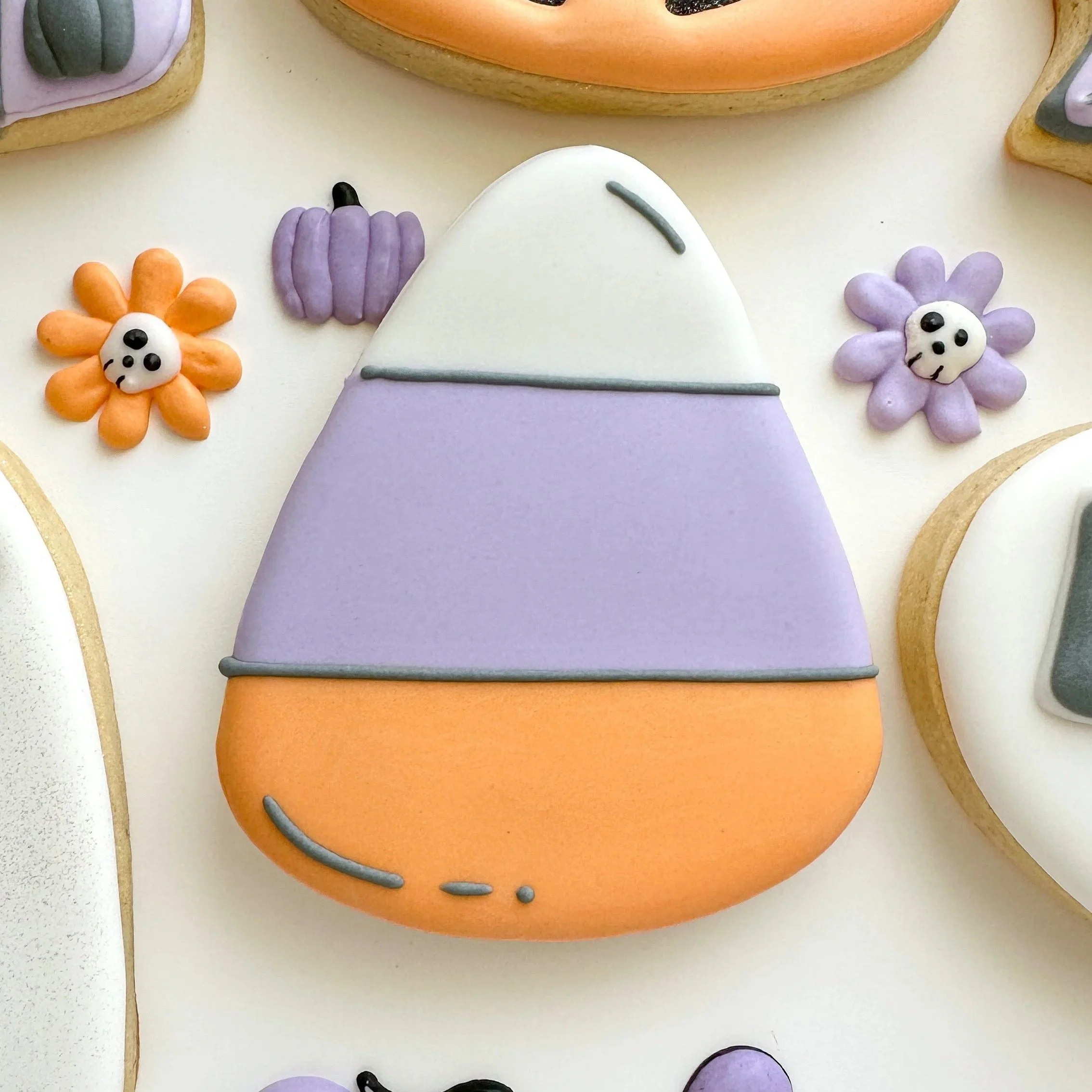 Candy corn decorated cookie