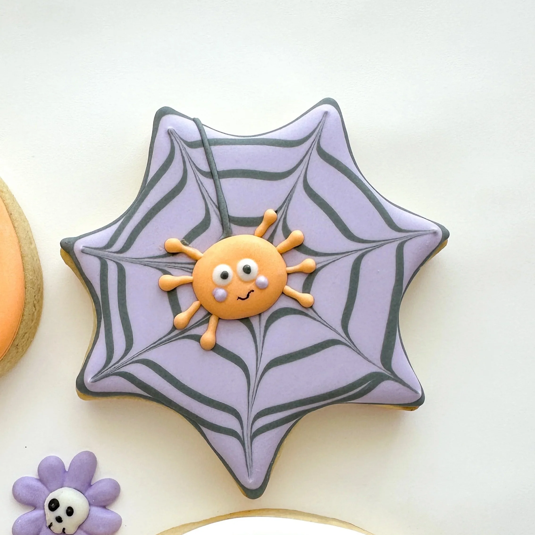 Spider in web decorate cookie