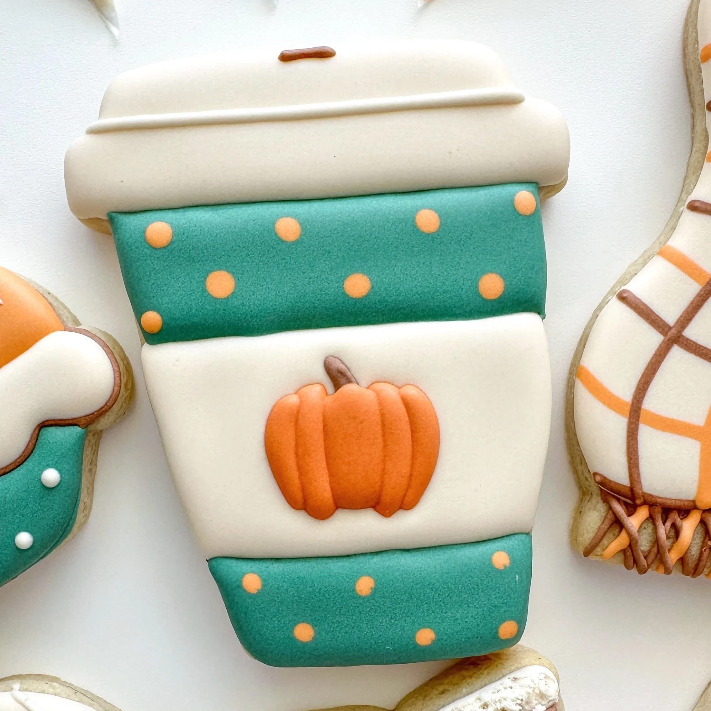 latte up decorated cookie with pumpkin decor