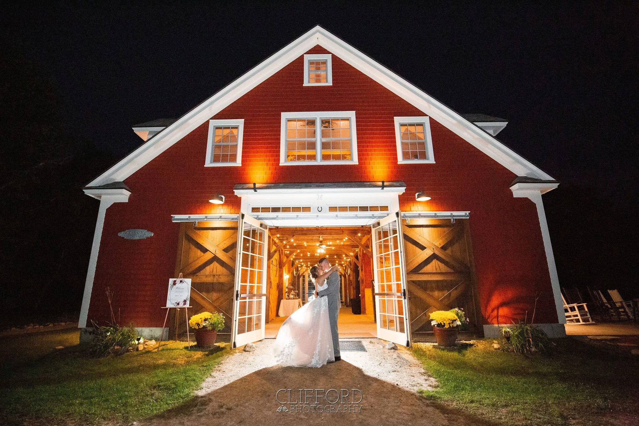 New Hampshire barn wedding venue at night.