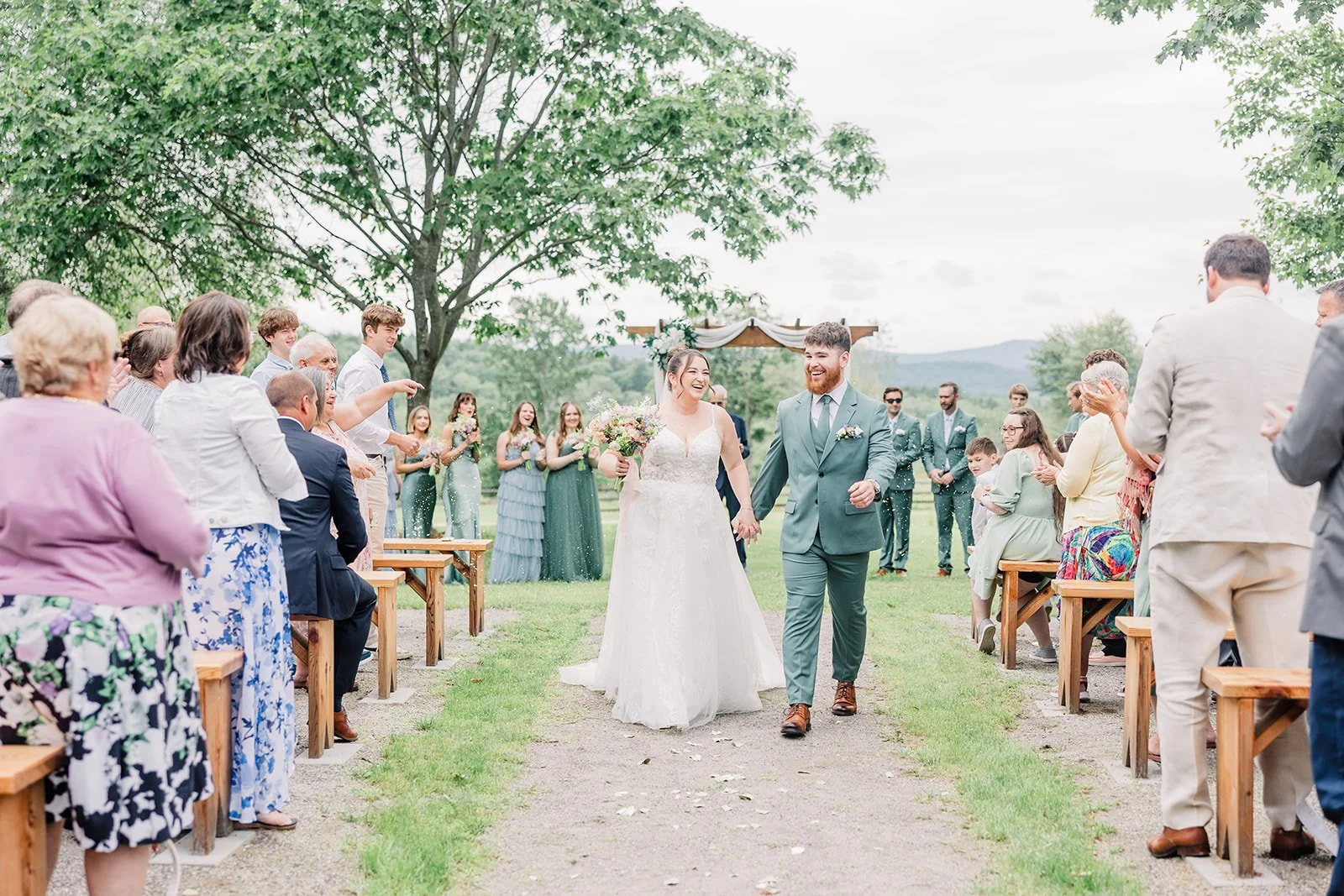 Recessional after a garden wedding ceremony.