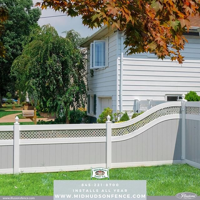 Duo tone vinyl fencing with a small lattice topper. The corner section you see here is something we call a &quot;j curve&quot; &amp; it's the perfect way to transition from a higher to lower height.
*
Fill out a submission form on our website or give