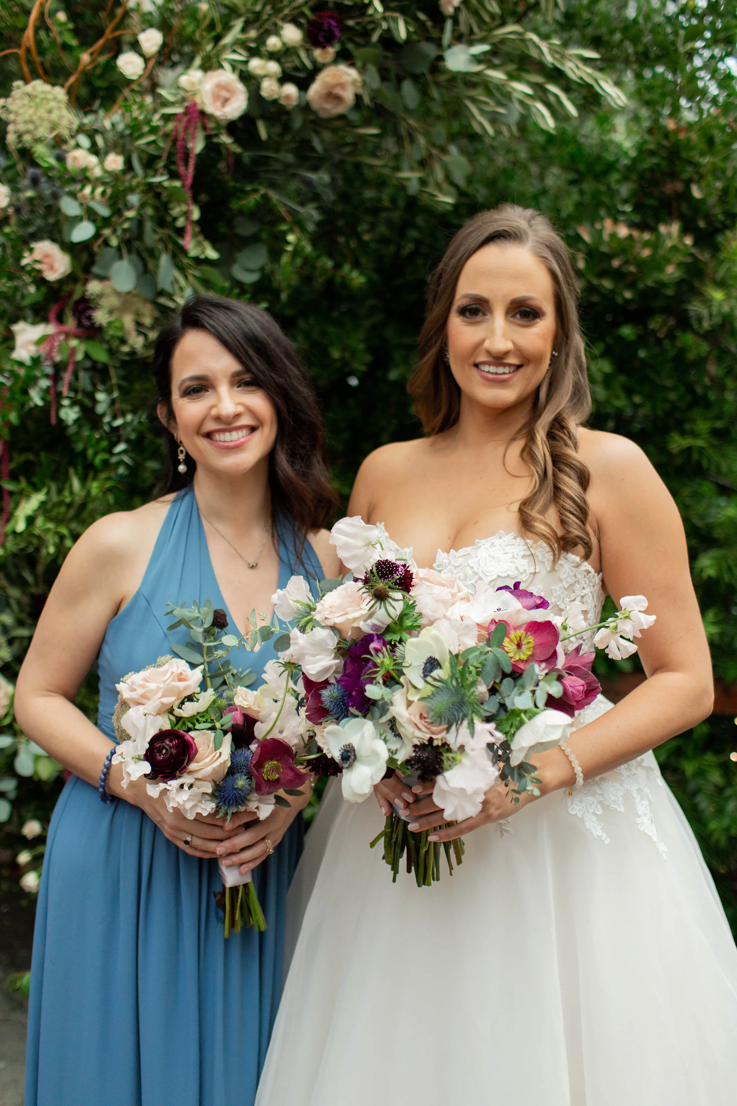 Wine Color & Blush Bridal Bouquet and Bridesmaid Bouquet. These wedding flowers would be perfect for a Sonoma wedding, Napa wedding, or Bay area Wedding.  The perfect California Wedding in March.  Burgundy, Wine Color and Blush Wedding Flowers.  Flow