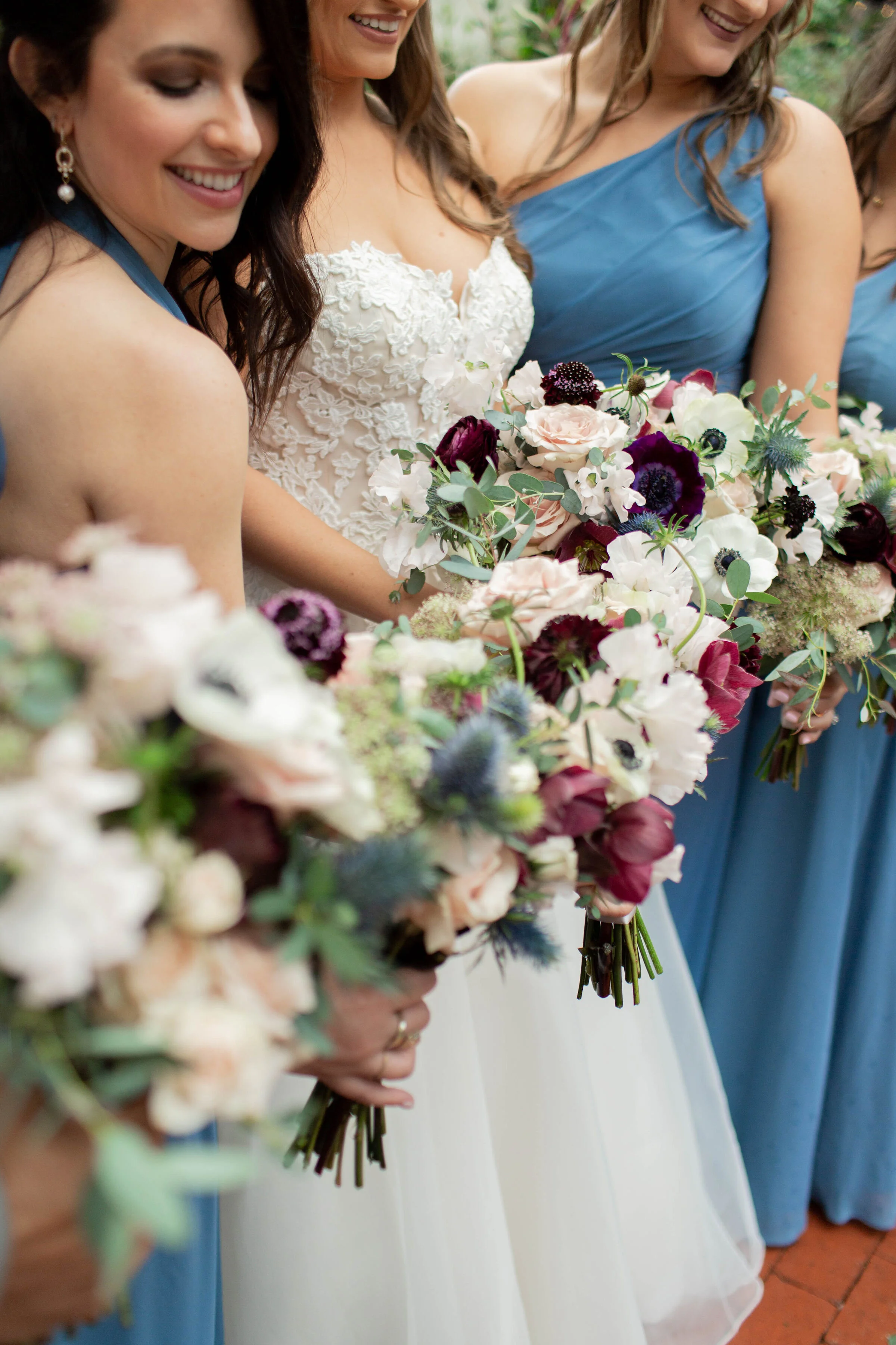 Wine Color & Blush Bridal Bouquet and Bridesmaid Bouquet. These wedding flowers would be perfect for a Sonoma wedding, Napa wedding, or Bay area Wedding.  The perfect California Wedding in March.  Burgundy, Wine Color and Blush Wedding Flowers.  Flow