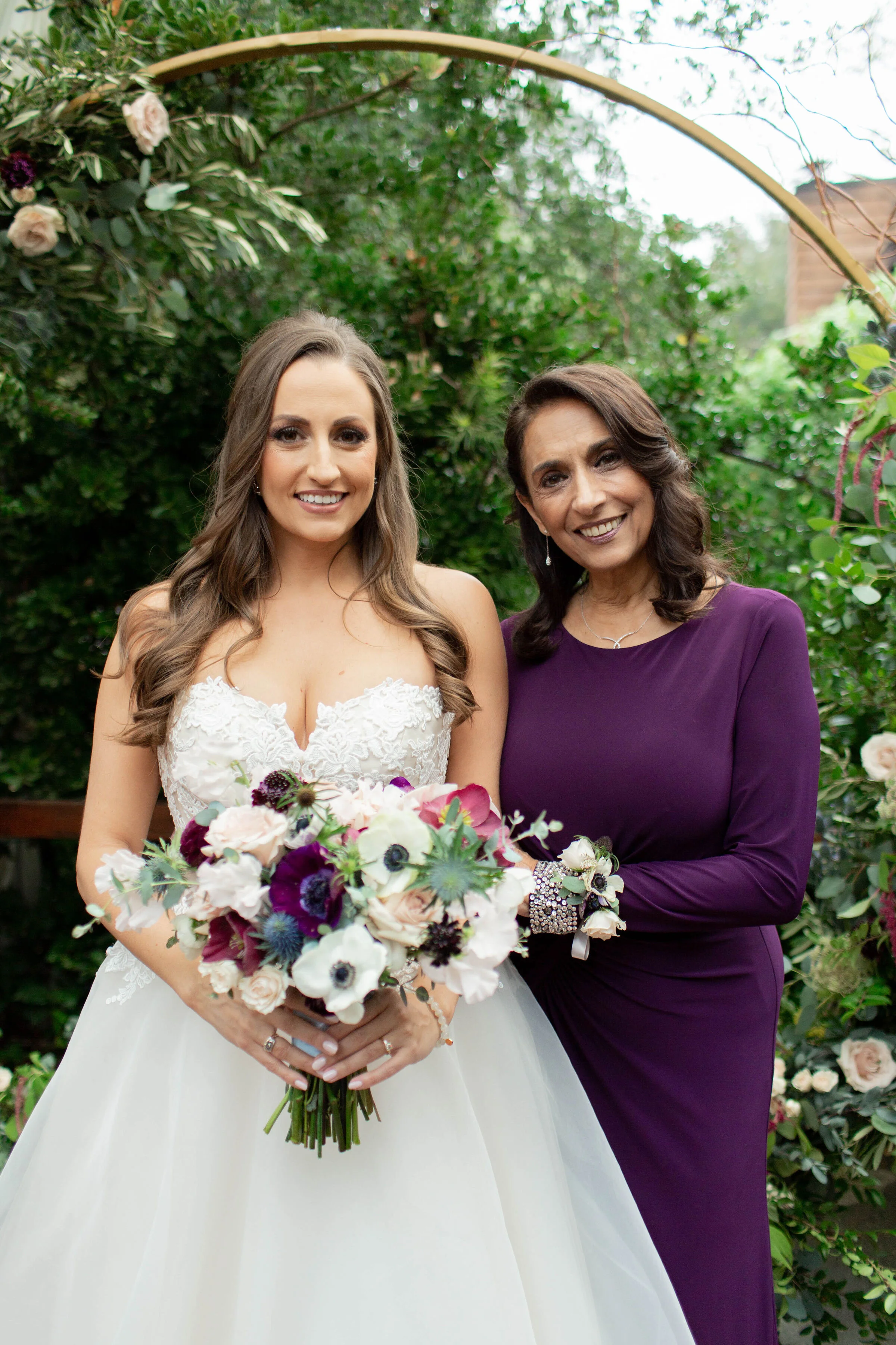 Wine Color & Blush Bridal Bouquet and Mother of the bride corsage. These wedding flowers would be perfect for a Sonoma wedding, Napa wedding, or Bay area Wedding.  The perfect California Wedding in March.  Burgundy, Wine Color and Blush Wedding Flowe