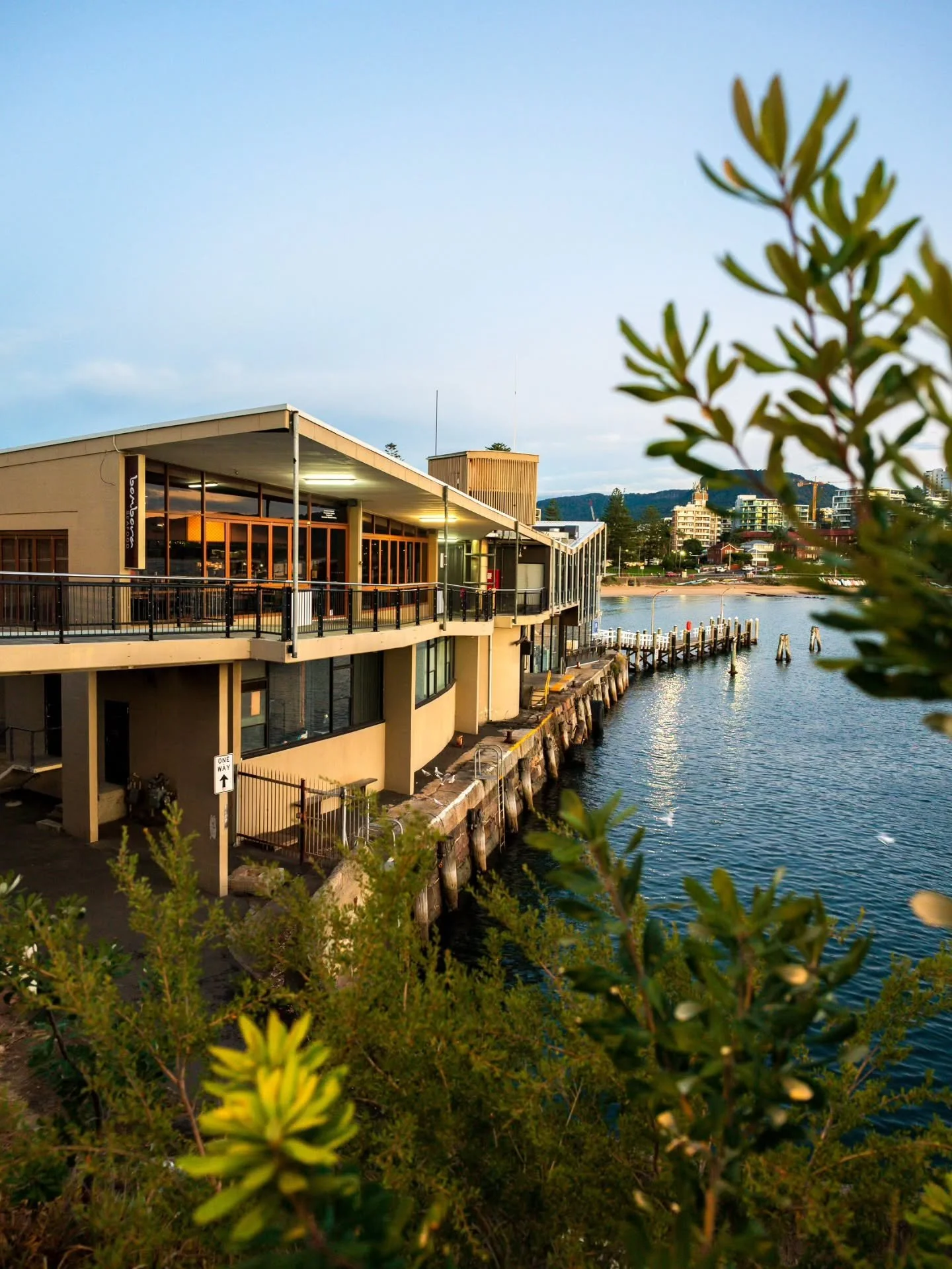 A couple of angles around the harbour I've never photographed before. First one of the building that houses the Harbourfront Restaurant and Bombora Cafe from up on the road right next to the walkway that takes you across to the building and the secon