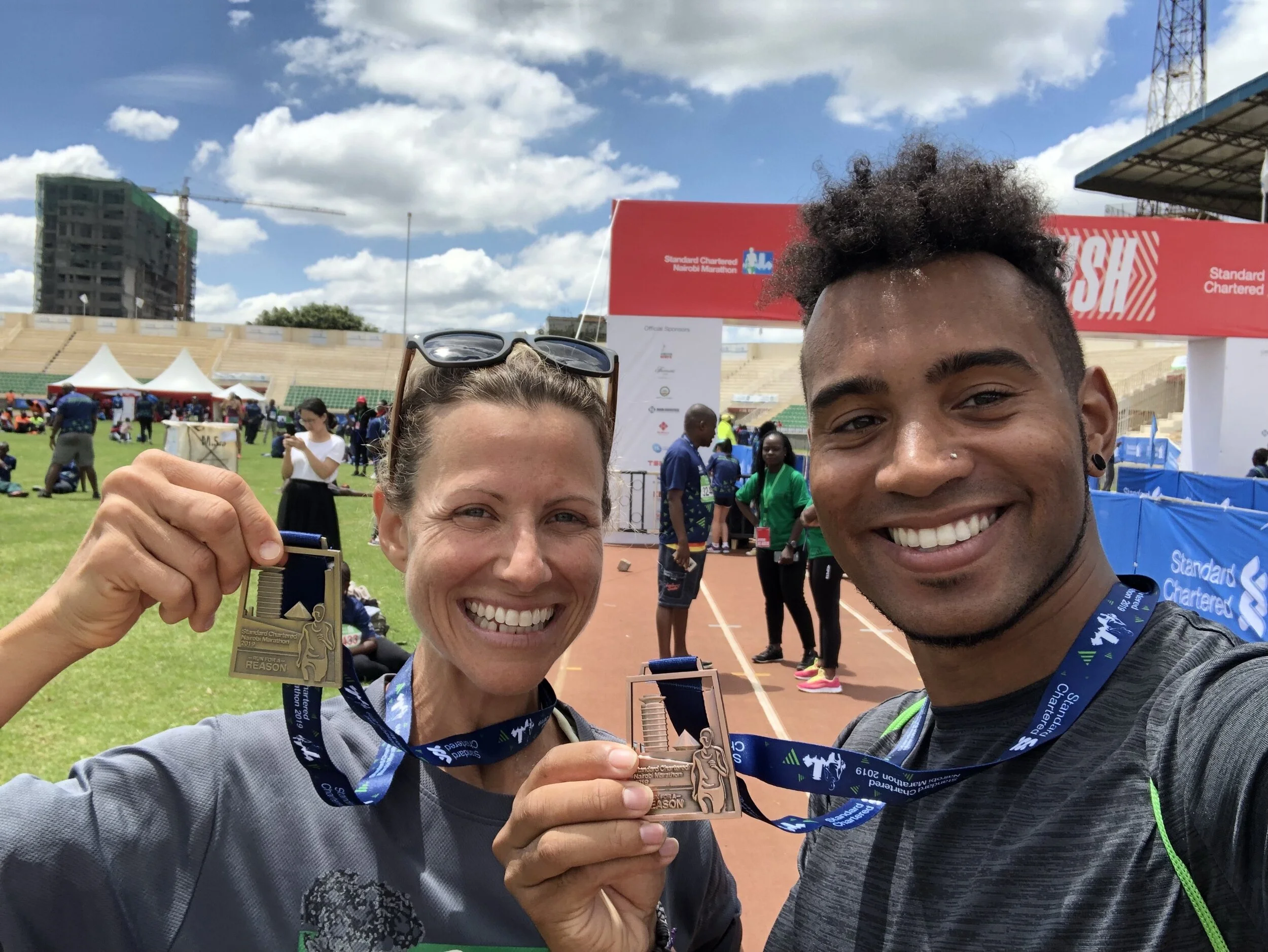 Our race medals at the finish line