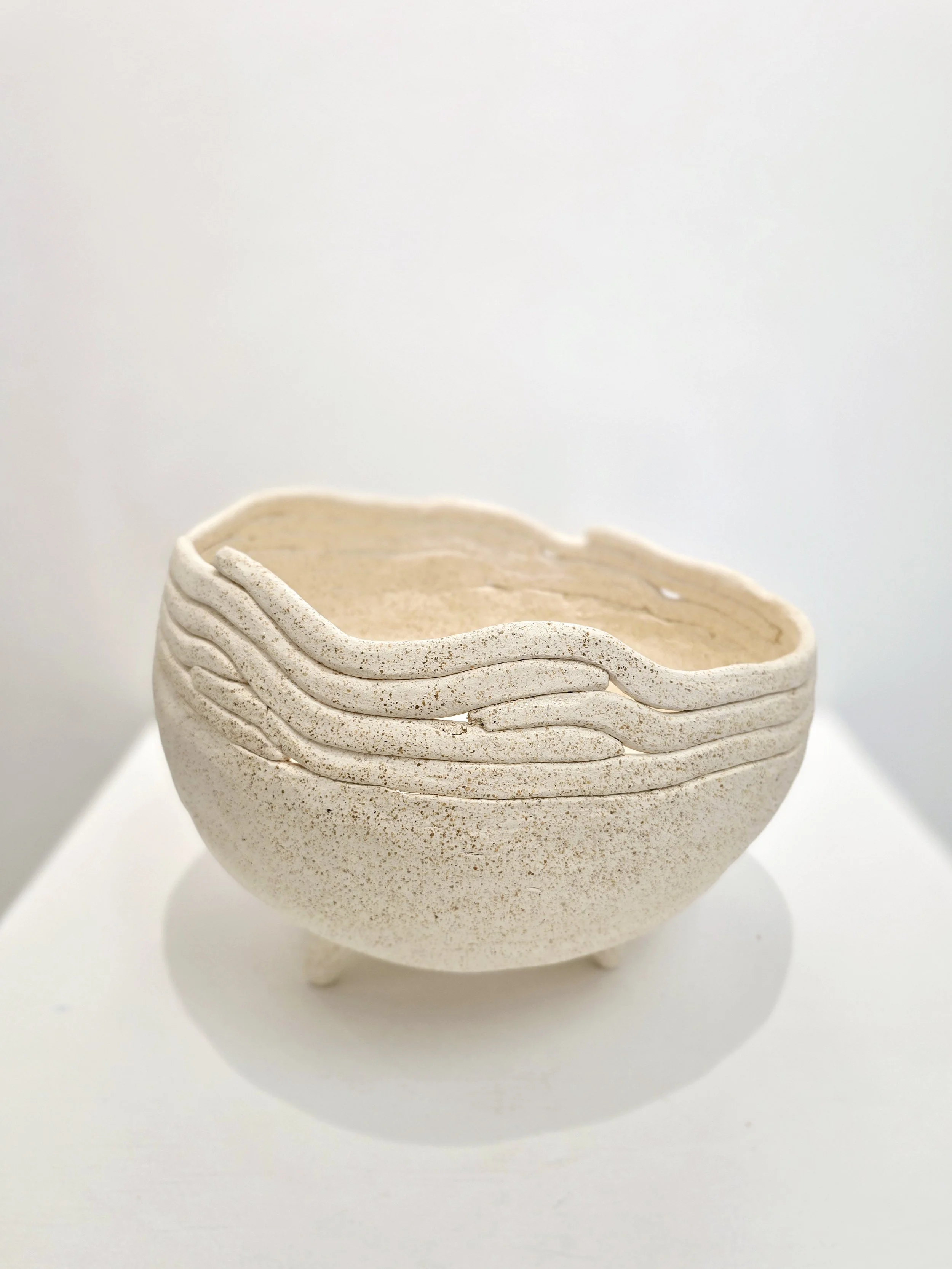 frutos, tripod 19, 2024 
micaceous clay, white (New Mexico), jacaranda flowers (Mexico City) 
14 x 9 x 9 inches
$700