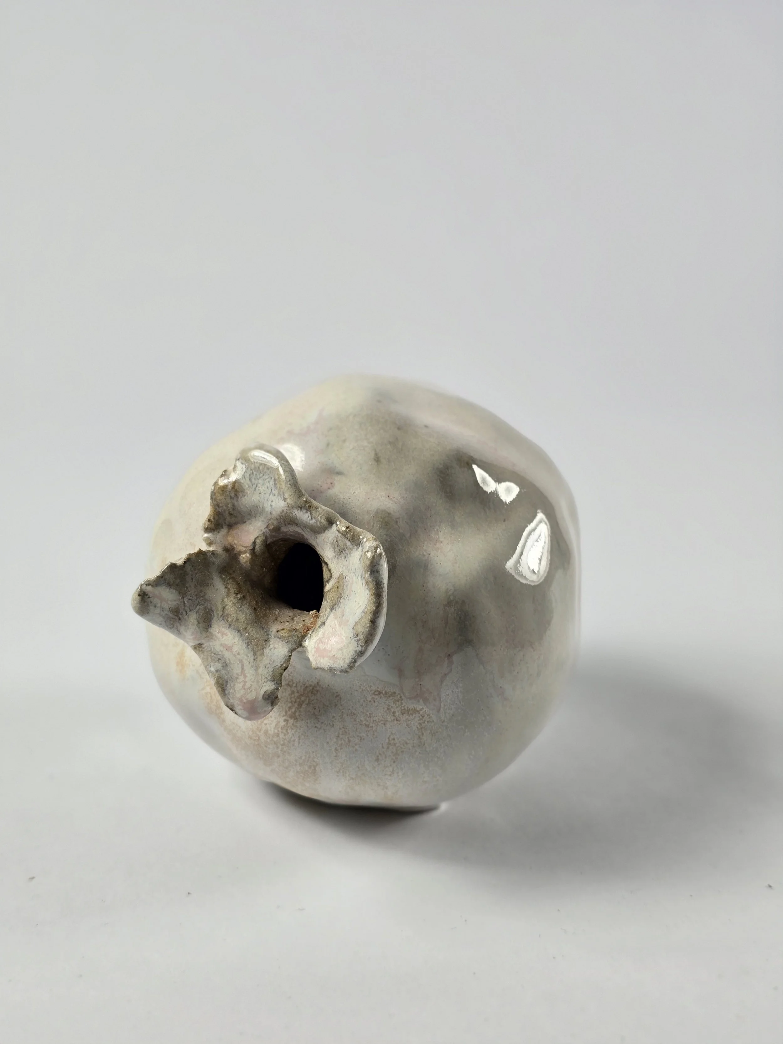 pomegranate (origins unknown), 2025
stoneware, glaze (origins unknown)
6 x 5 x 5 inches
$500