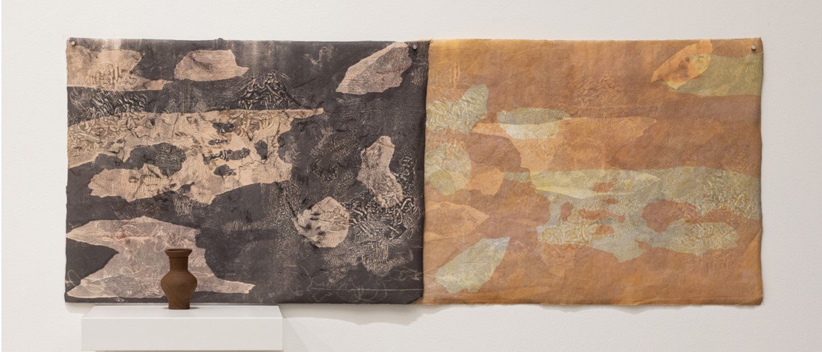 Diane Machado
Mimicry2—Fica no meio (In the middle), 2024-ongoing
Monoprints (multiplate, monotype with drypoint prints on mulberry paper),  and Tourist Souvenir with shelf (c. 17th century reproduction clay water jug, S.Miguel, Azores)
19 (h) x 45 i
