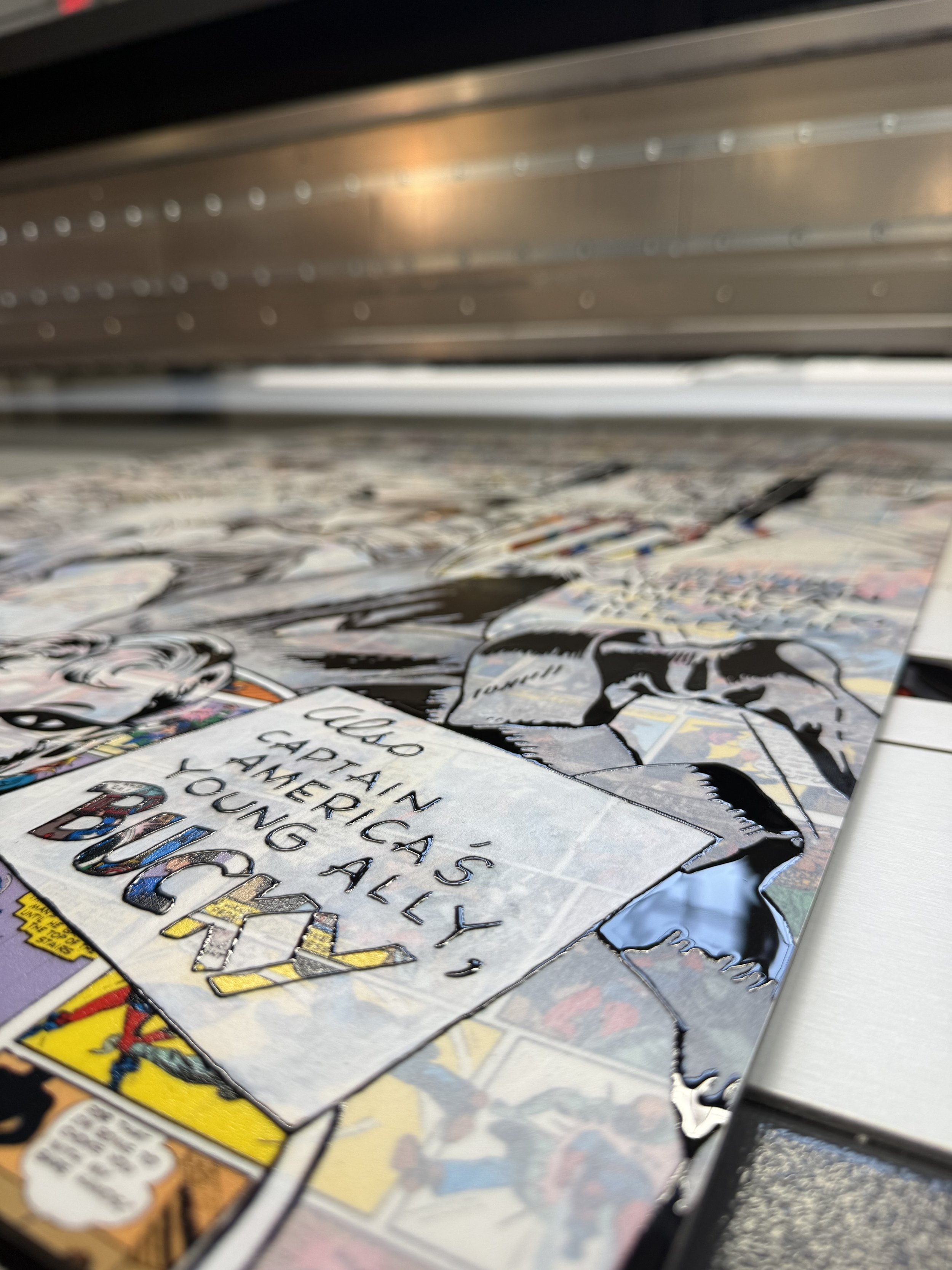 Colorful comic book page on a table with the headline 'Hello, Capitan!'.