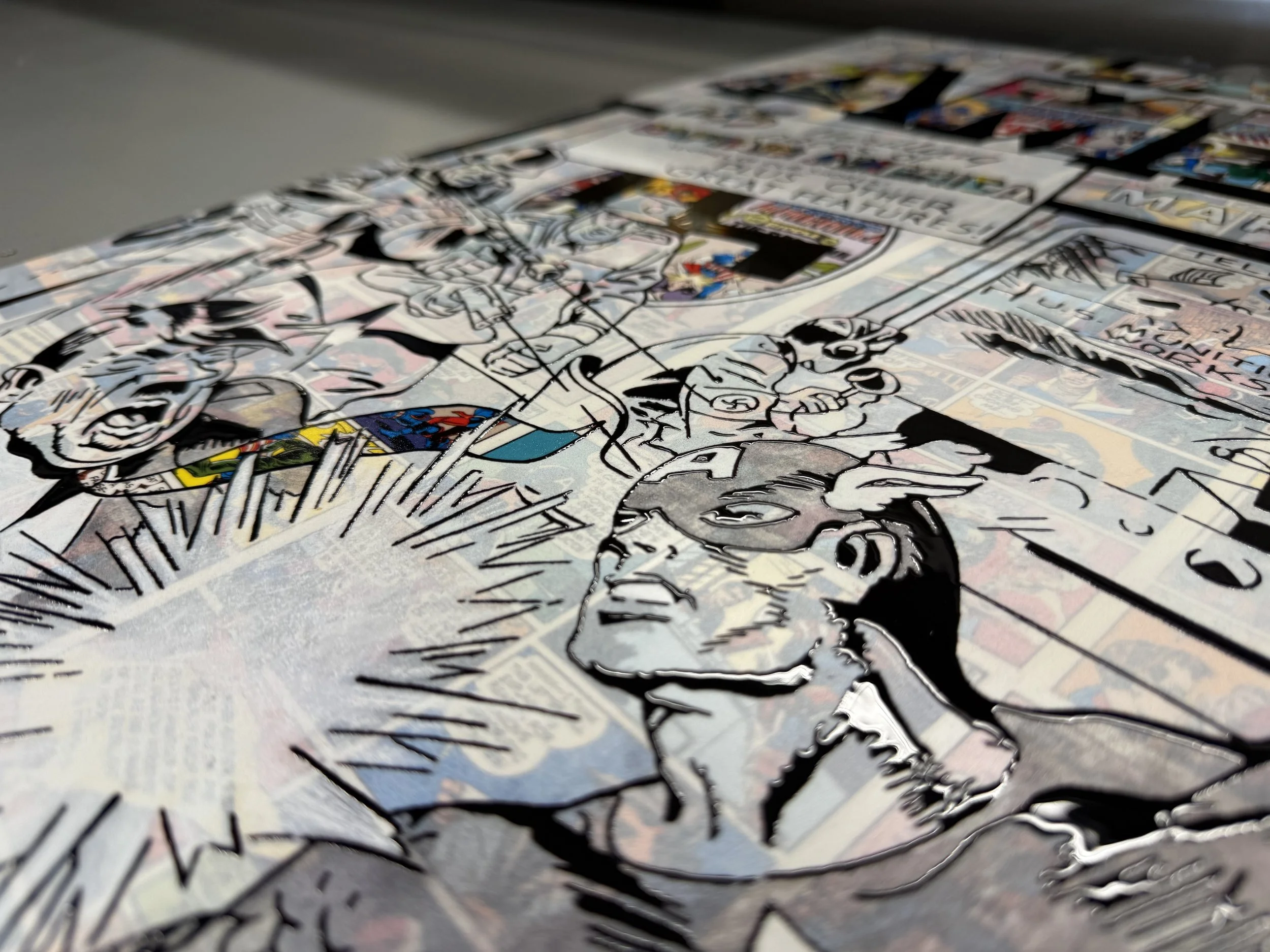 Close-up of a colorful comic book page, showing various panels and illustrations with characters and dialogue.