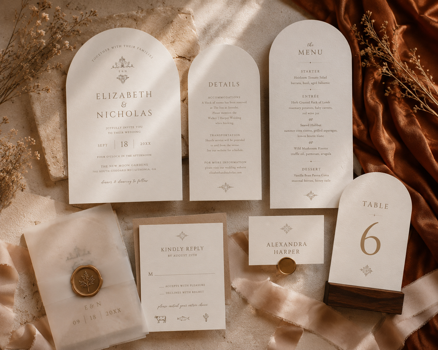 Luxury arch wedding stationery suite featuring coordinating invitation, RSVP card, details card, menu, place card, table number, and vellum wrap in a warm neutral colour palette.