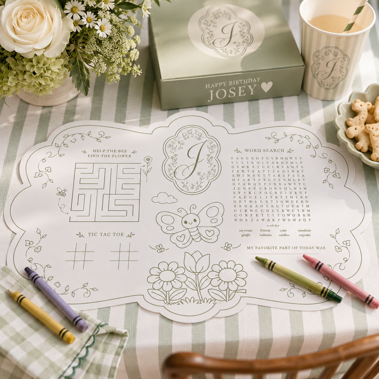 Illustrated garden themed children's activity placemat featuring a floral monogram, butterfly coloring page, maze, word search and party games for a birthday celebration.