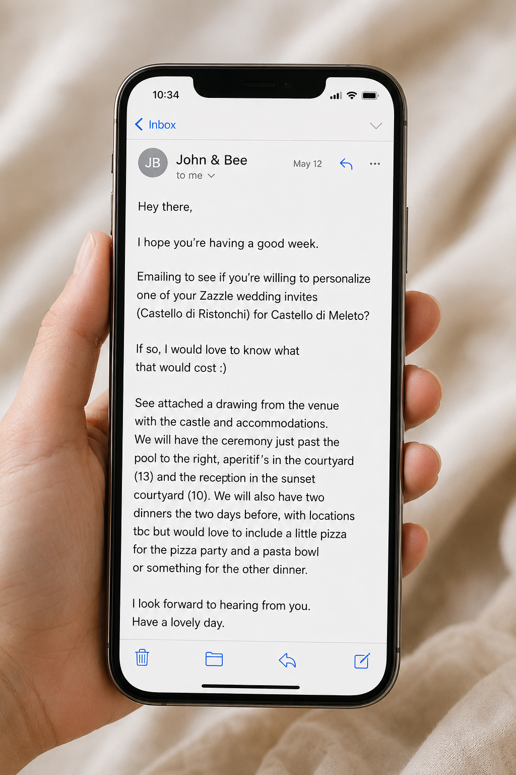 Phone mockup displaying the original client email that launched a custom illustrated destination wedding suite for Castello di Meleto in Tuscany.