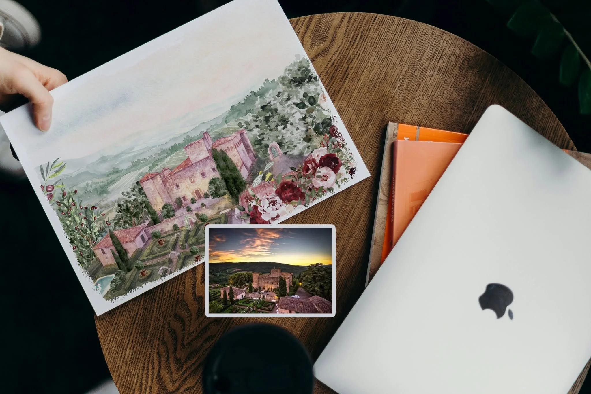 Comparison of the original reference photograph and finished hand-painted watercolor illustration of Castello di Meleto, showing the custom artwork created for a bespoke destination wedding stationery suite.