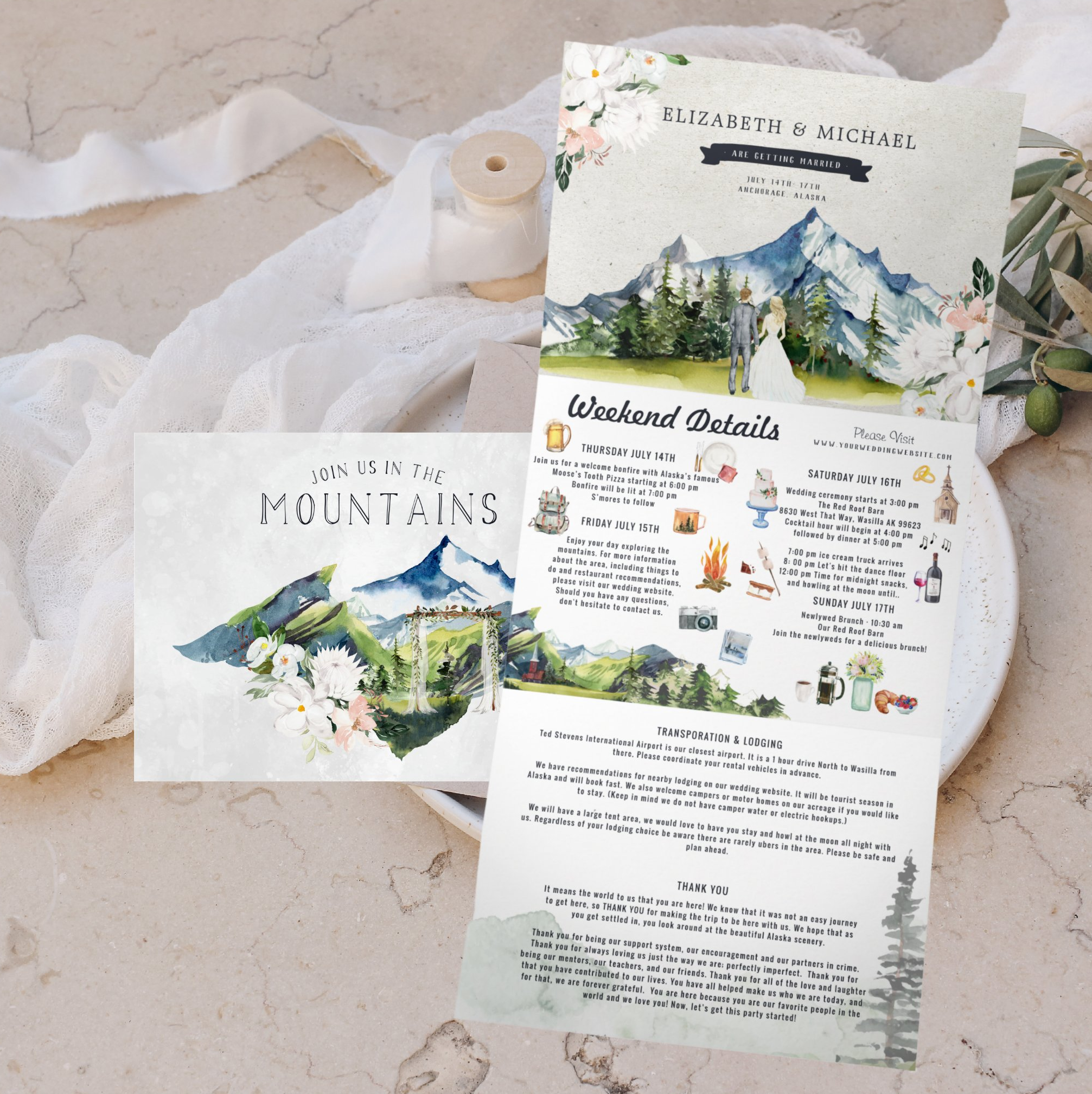 Flat lay of a custom illustrated wedding weekend invitation suite for an Alaska mountain wedding. The suite includes a watercolor tri-fold invitation featuring dramatic glacial peaks, evergreen forests, a bride and groom illustration, a weekend itine