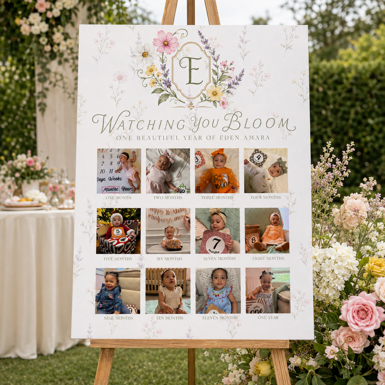 Garden-themed first birthday milestone board displaying twelve monthly baby photos on a floral easel display.