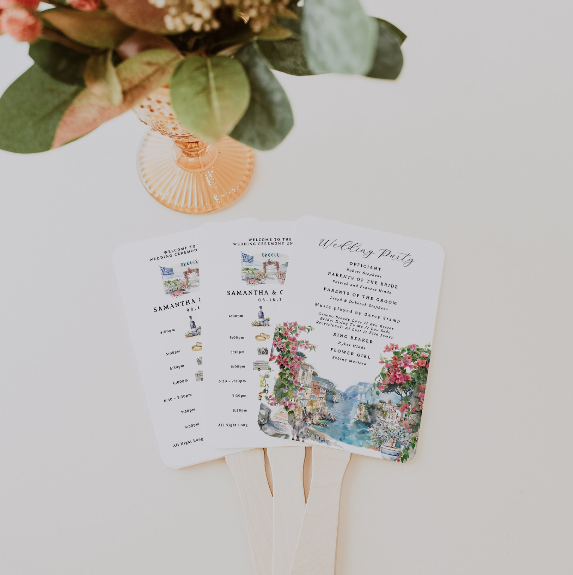 Illustrated wedding program fan featuring ceremony timeline, wedding party details, and custom destination artwork.