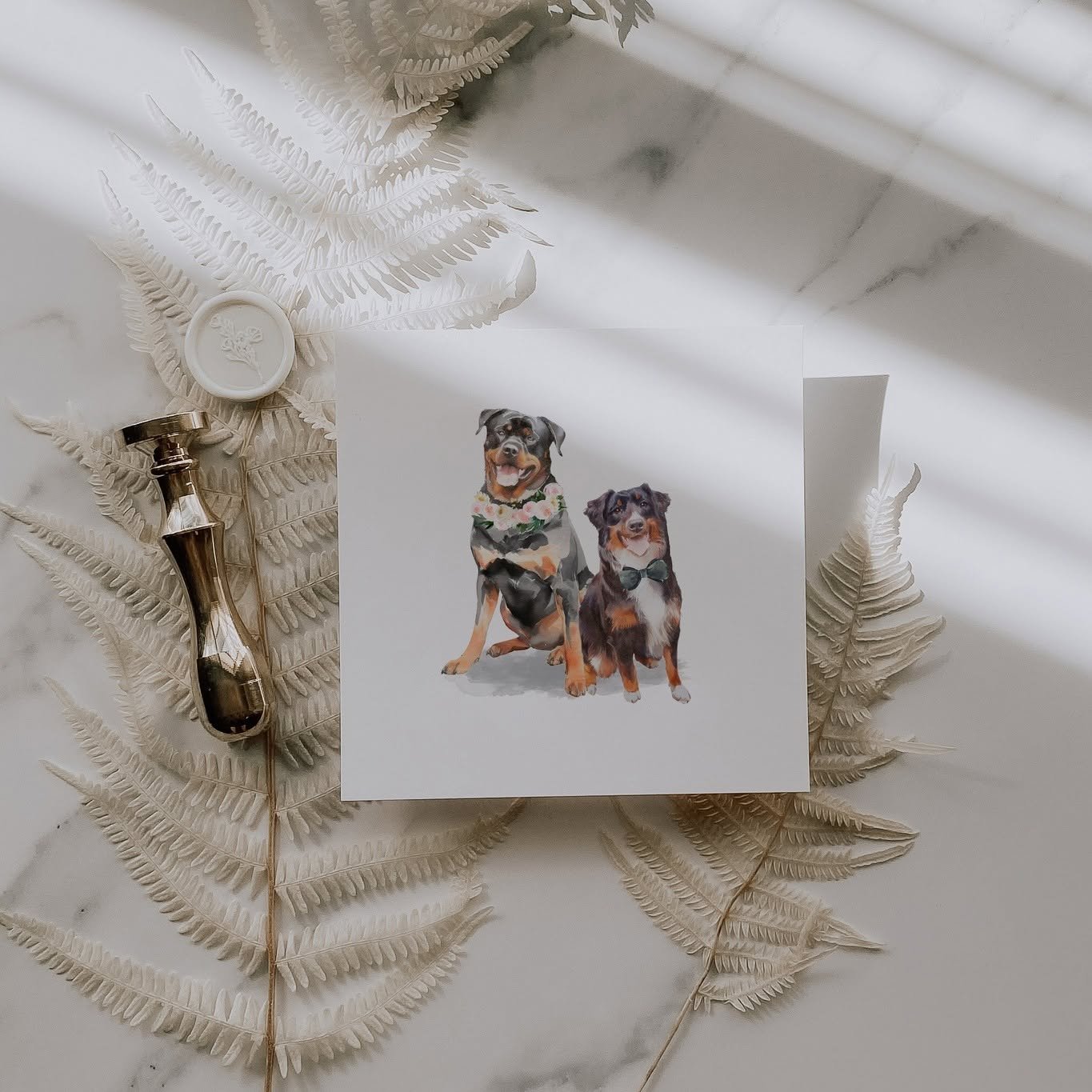 Custom watercolor wedding pet portrait featuring a Rottweiler and Australian Shepherd dressed with floral collar and bow tie, displayed as personalized wedding artwork and keepsake for couples.