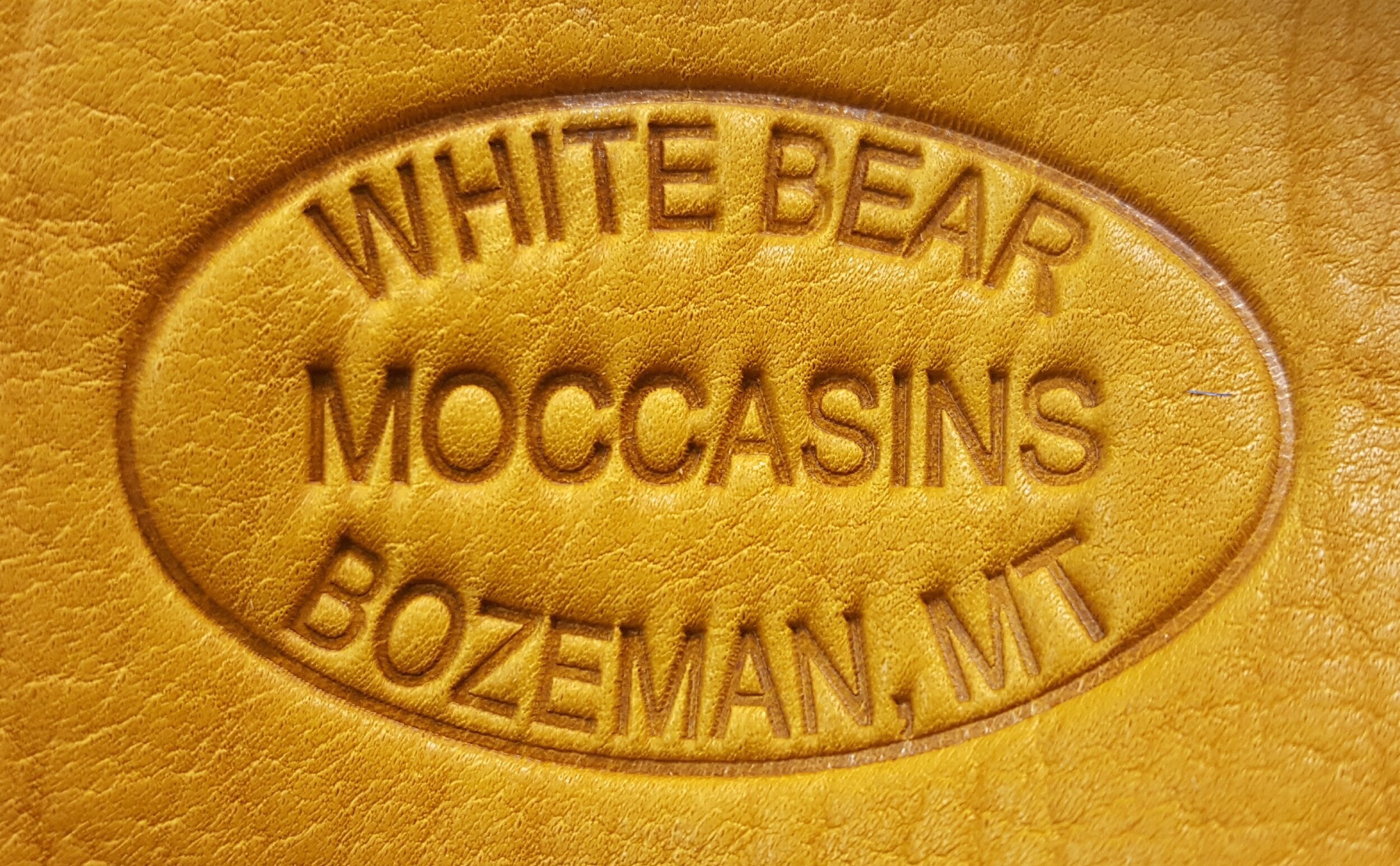 white bear moccasins