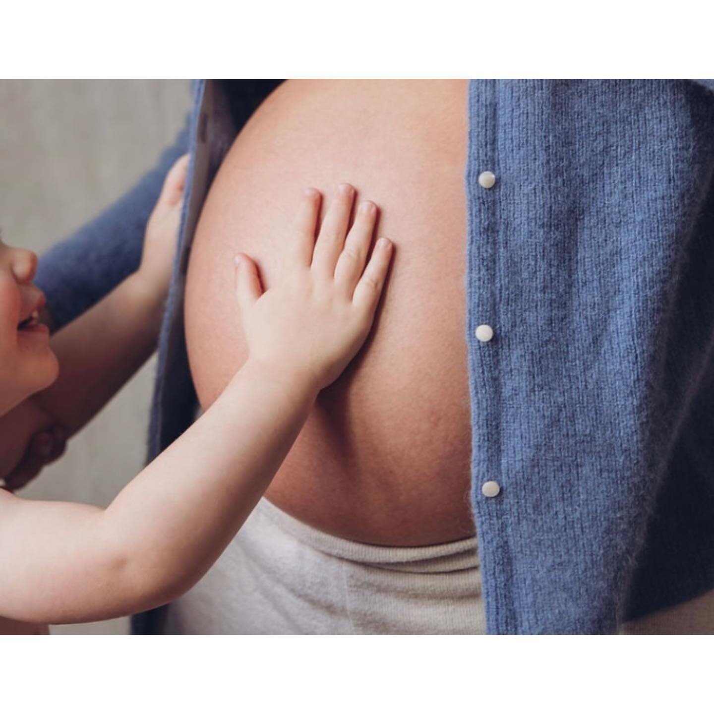 Those tiny hands that grow too fast and will very soon take care of even smaller hands. 
The moment the first baby meets their smaller sibling for the first time and becomes the big brother or sister, that moment is so emotional and beautiful. My eye