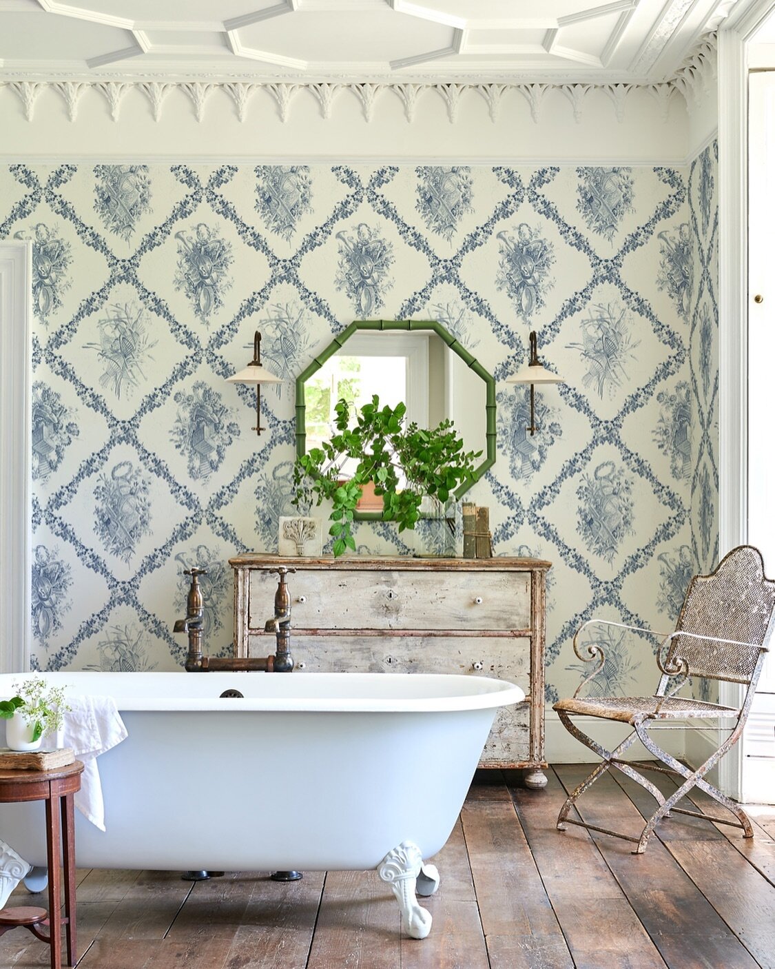 Lovely to have one of our wallpapers in the French Country Bathrooms piece for @homesandgardensofficial! We couldn&rsquo;t agree more that the perfect accompaniment to a gorgeous @drummonds_bathrooms roll top is our Leeds Castle Aubusson Espalier wal