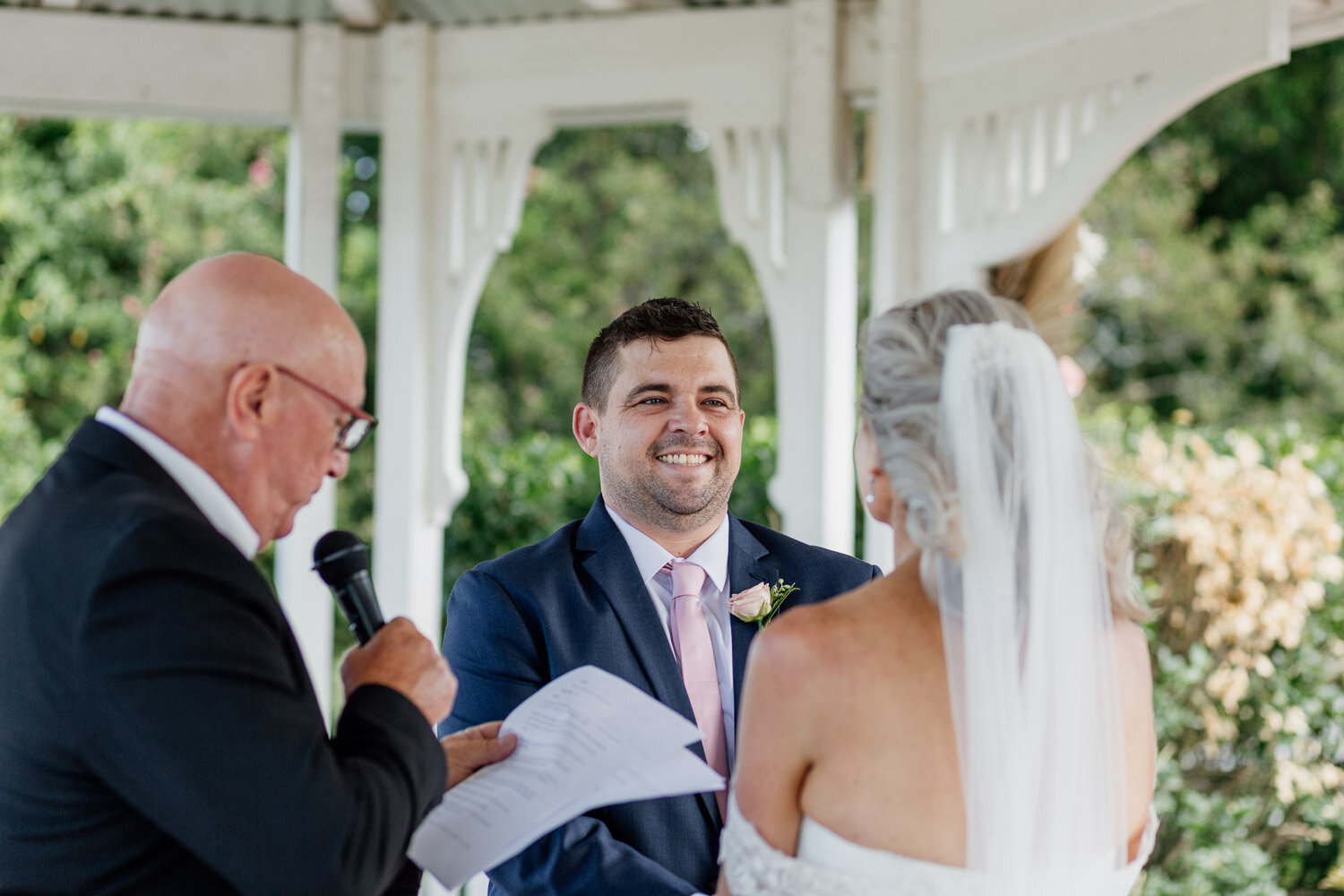 smiling groom at wedding ceremony