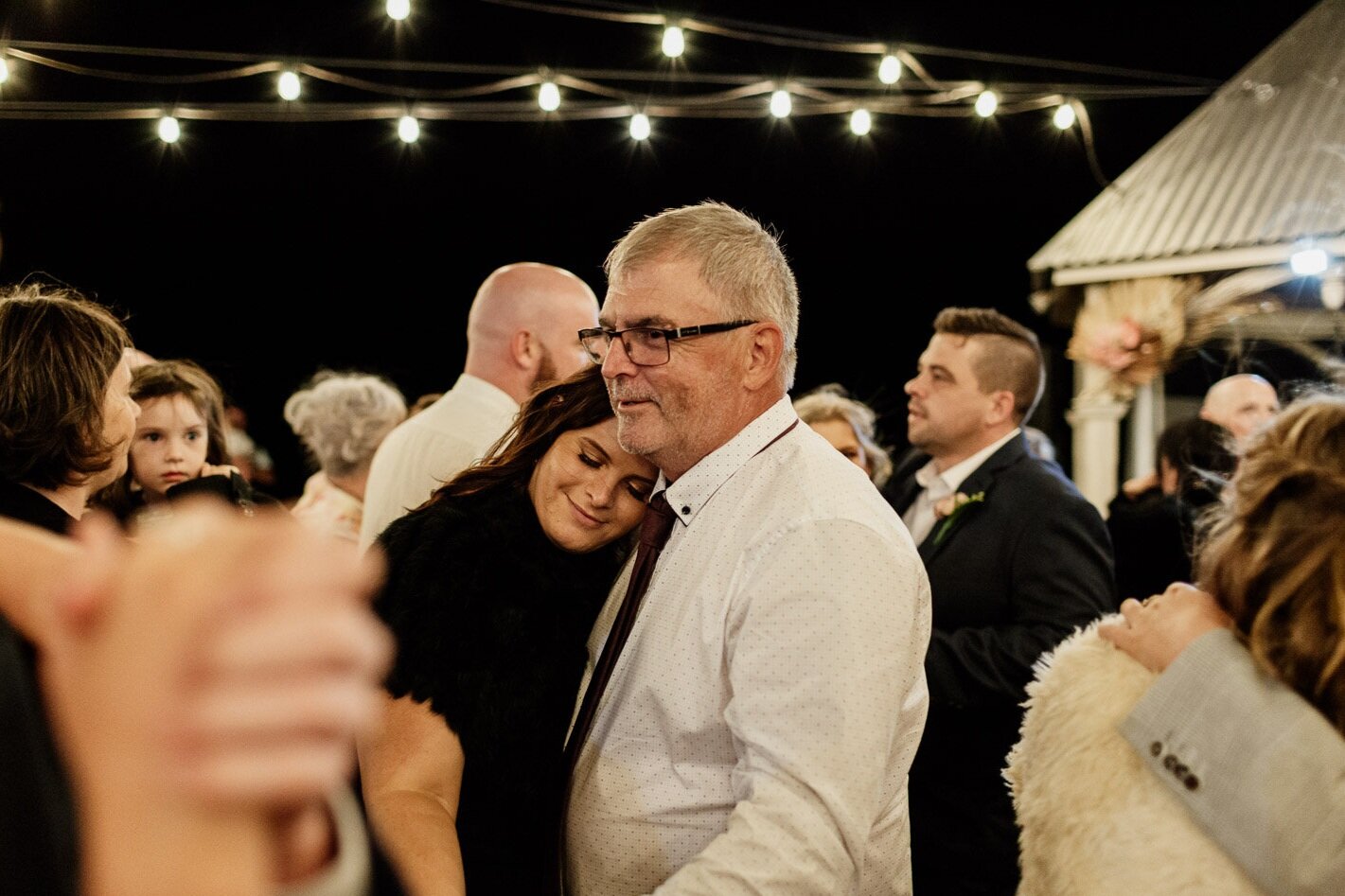 Father and daughter hug at wedding (Copy)