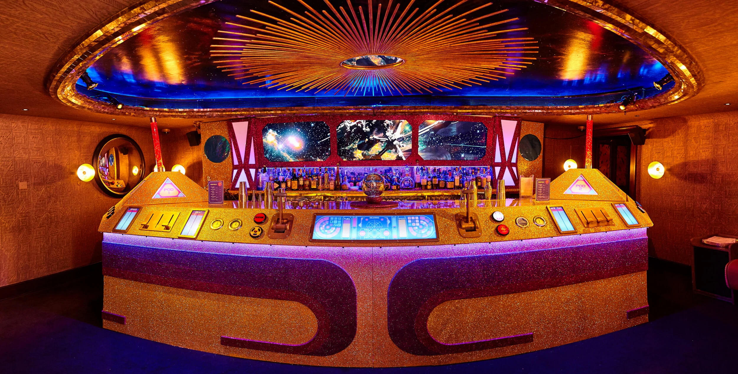  Glitter spaceship bar. The bar top and the dance floor were both coated with clear cast resin, over the glitter, so that they could be easily cleaned.  