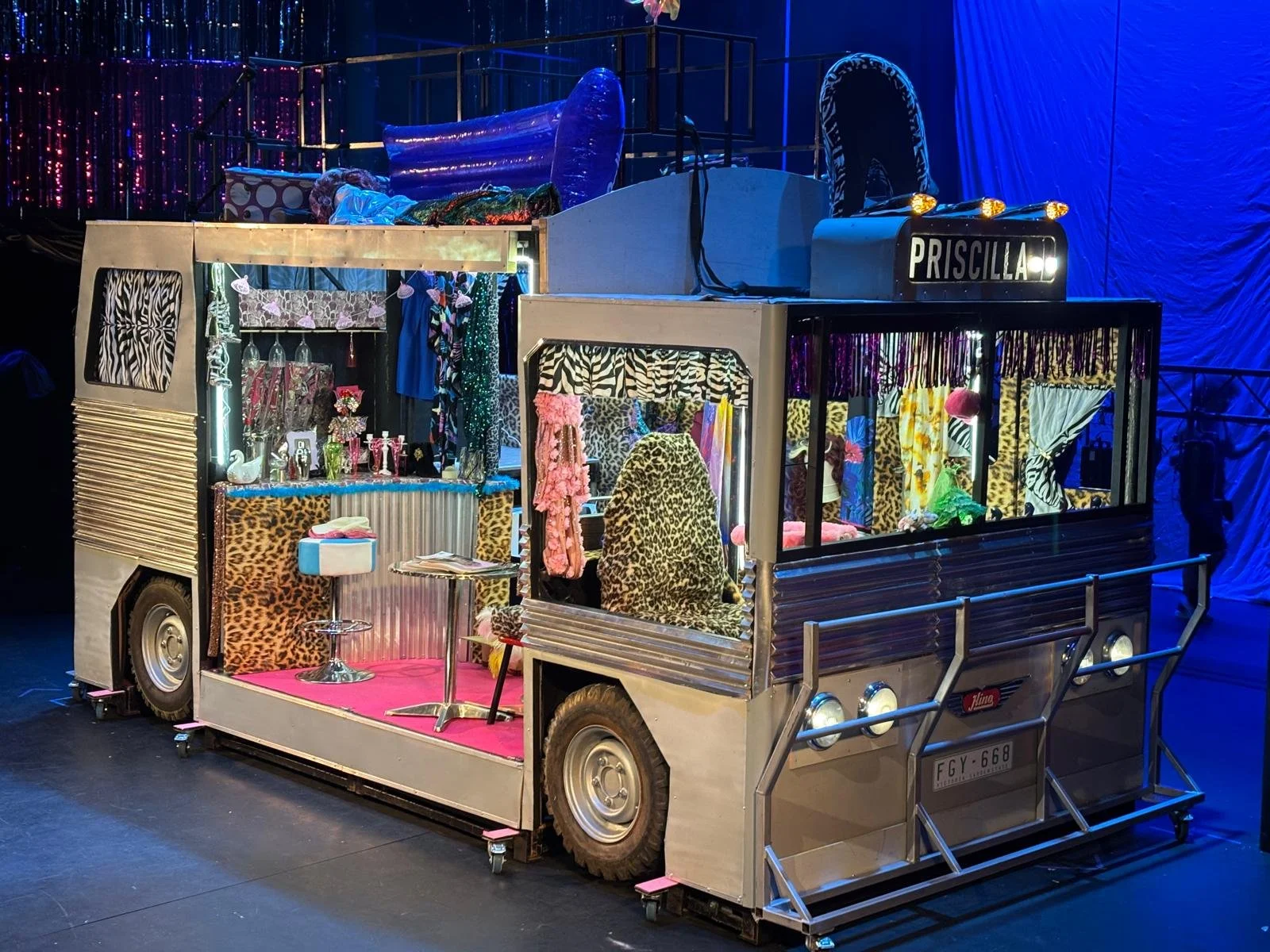Priscilla Queen of the Dessert,  set design, theatre packages - set and prop hire - set hire - musical productions - Aladdin - Annie - back to the 80's - beauty and the beast - movable bus - into the woods - Charlie and the chocolate factory