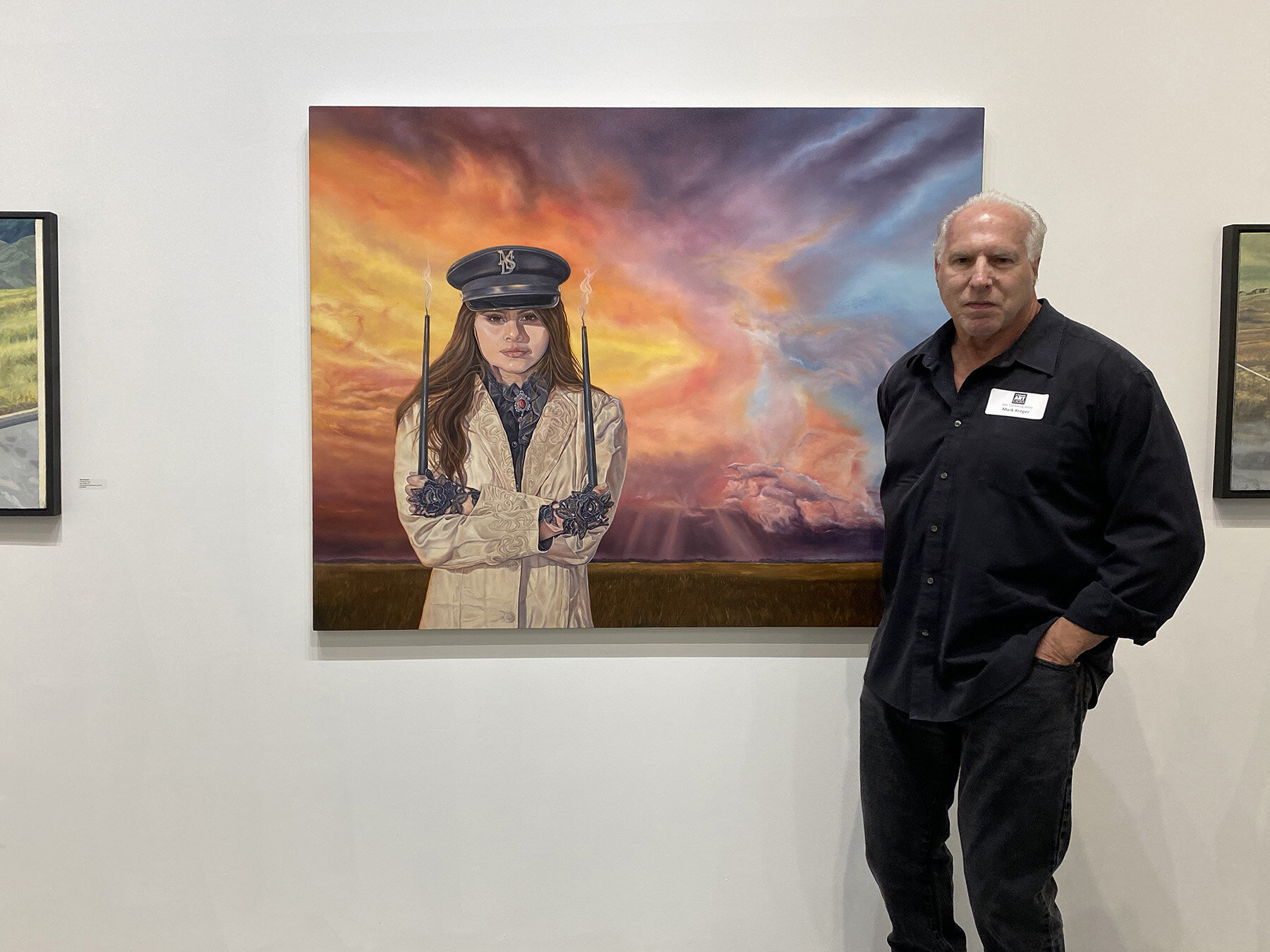   Mark Kreger  with his painting “Final Promise” 