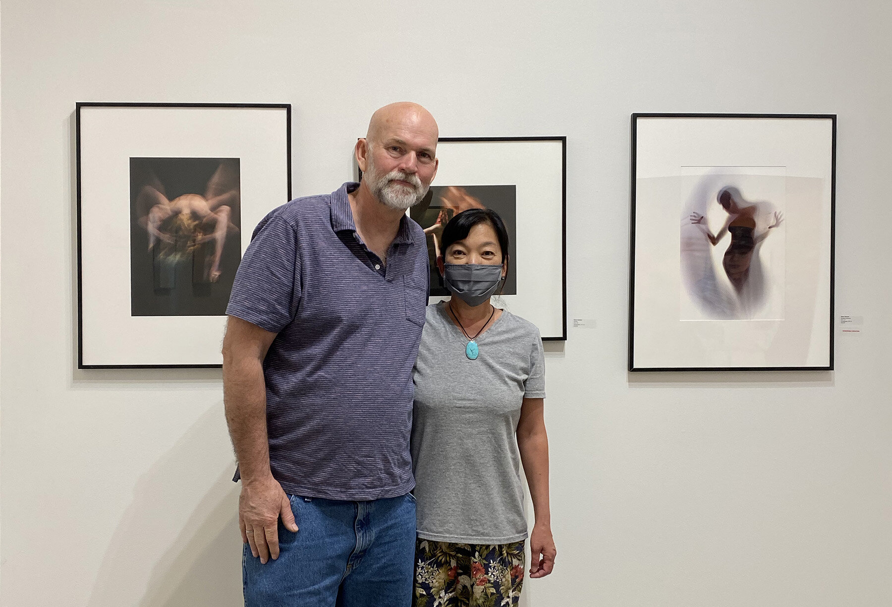  Dave Hanson  and Izumi-san with his photographies “Energetic Evolution”, “Passing”, and “Gesteral Photo #3” 