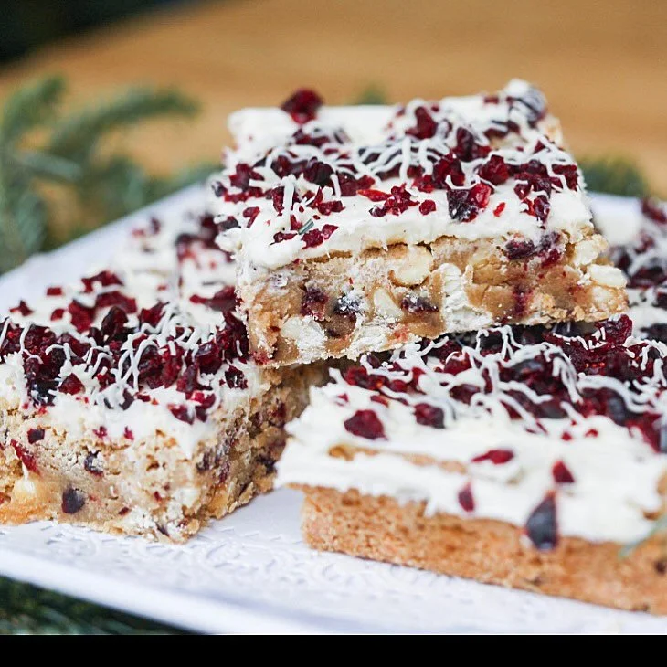 White Chocolate Cranberry Bars, Brownies, Lemon Bars, German Chocolate Bars, Pecan Bars, and Cream Cheese Brownies are all available to order by the Dozen $39+tax