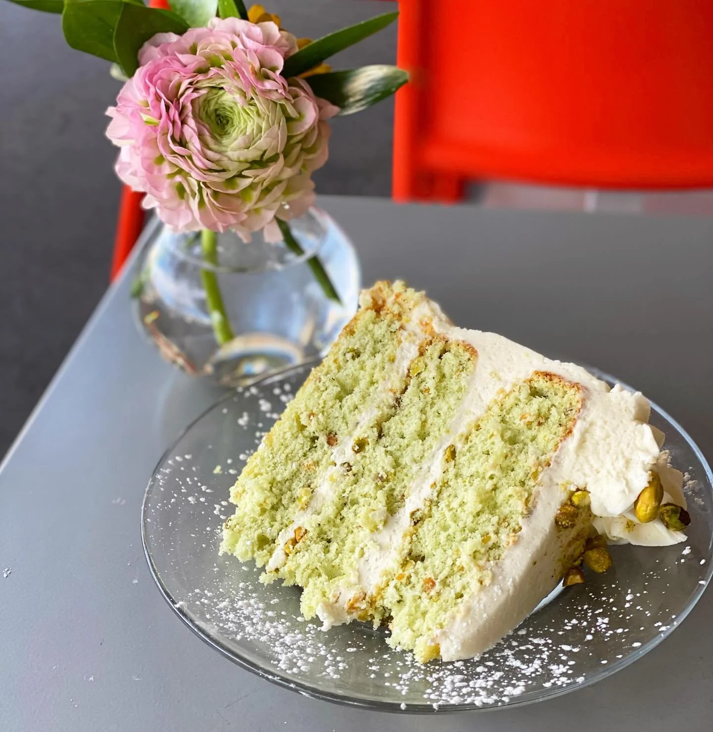 3-layer dyed white cake with pistachios
+ pistachio buttercream frosting