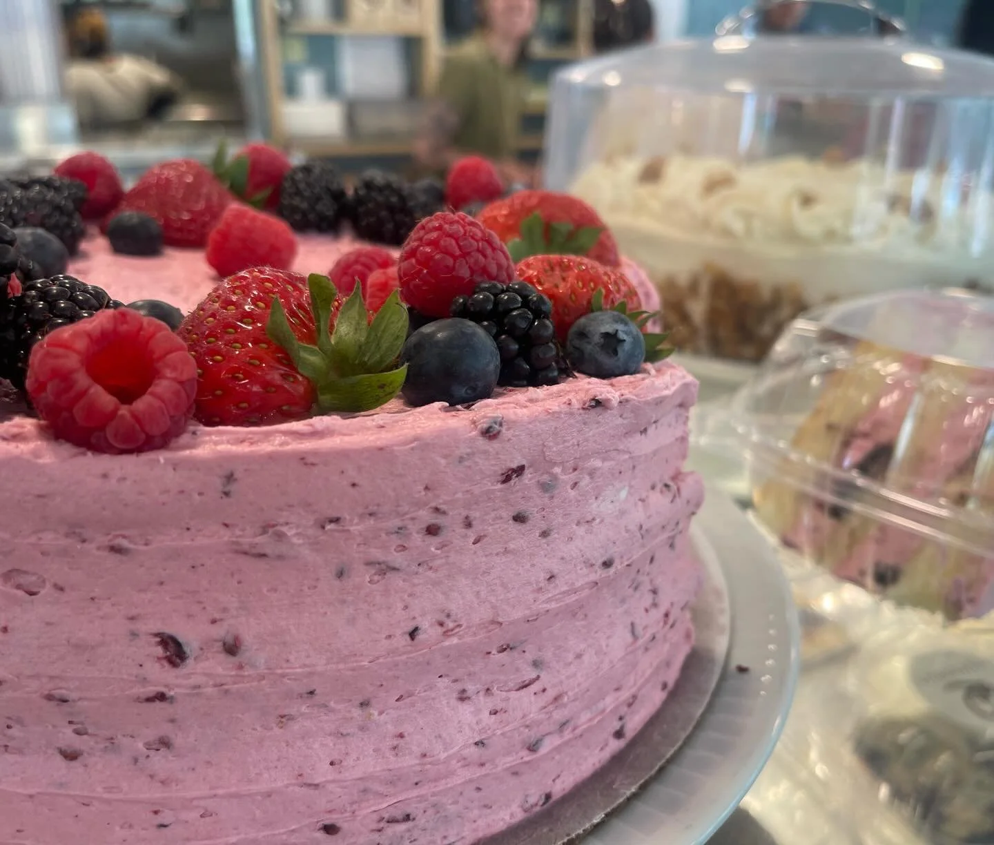 She&rsquo;s back: our popular 3-layer yellow cake filled with fresh blackberries + blackberry buttercream frosting. Order whole for your May or June Special Occasion $65 and 👀 our weekly menus for by the slice.