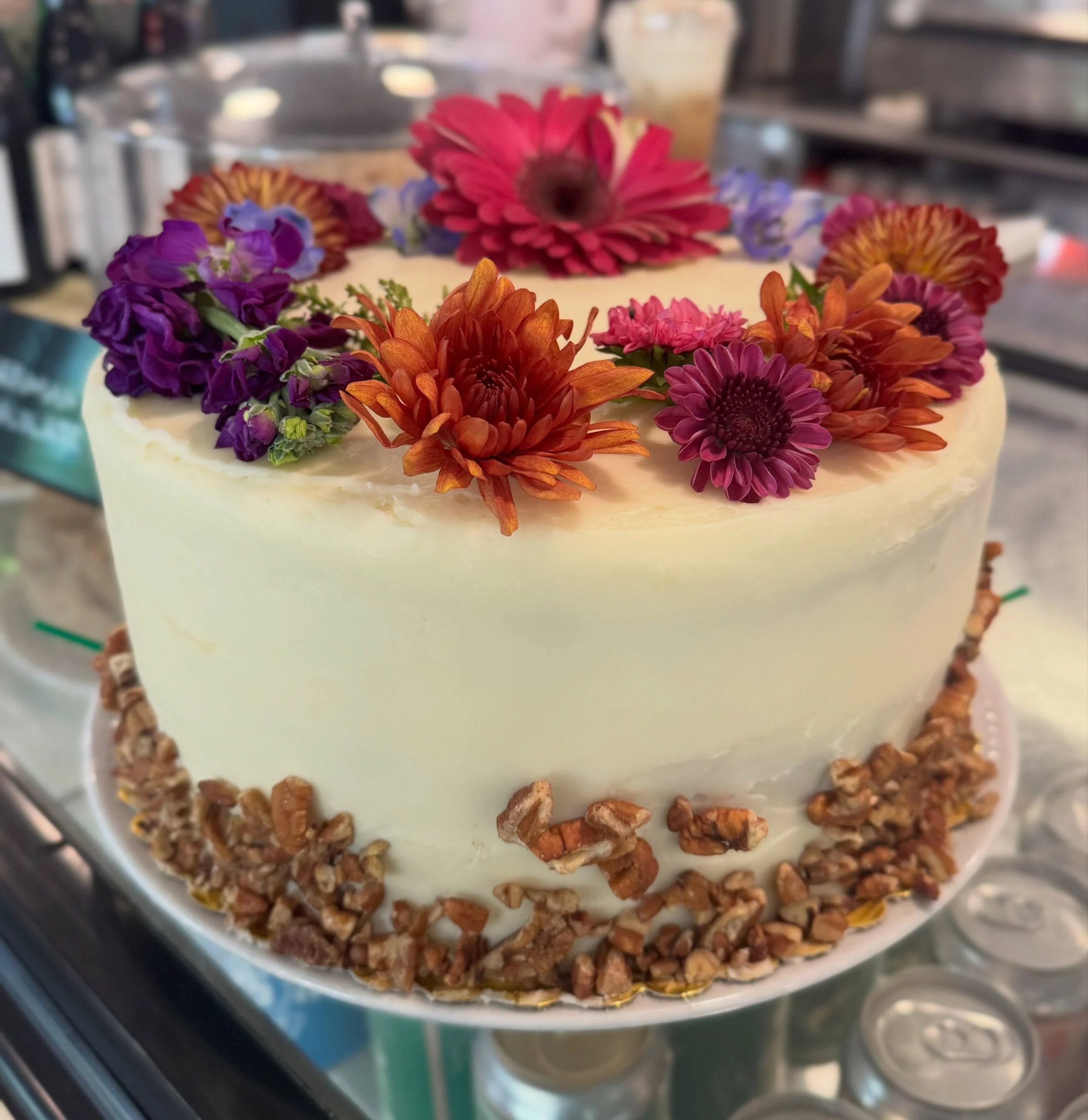 Isn&rsquo;t she a beaut?! 🍂🌸

Our Pumpkin Cake is almost too pretty to eat&hellip; ALMOST! 

Two layers of pumpkin cake filled with pecans, pineapple &amp; golden raisins, finished with pumpkin cream cheese frosting.

A seasonal beauty, available O