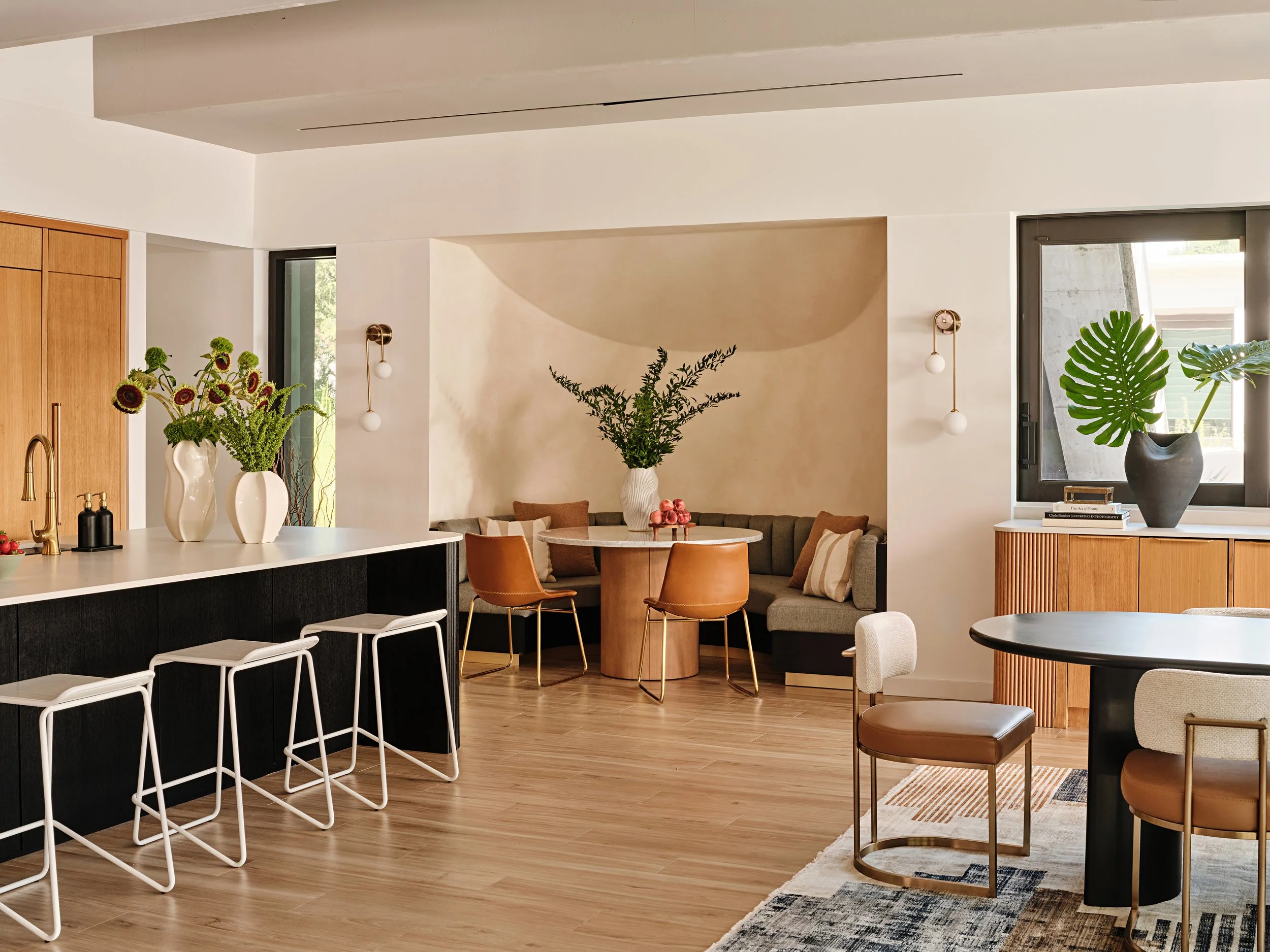 Breakfast nook in a Kendall new-construction home with limewash walls, interior design by Concept 2 Design