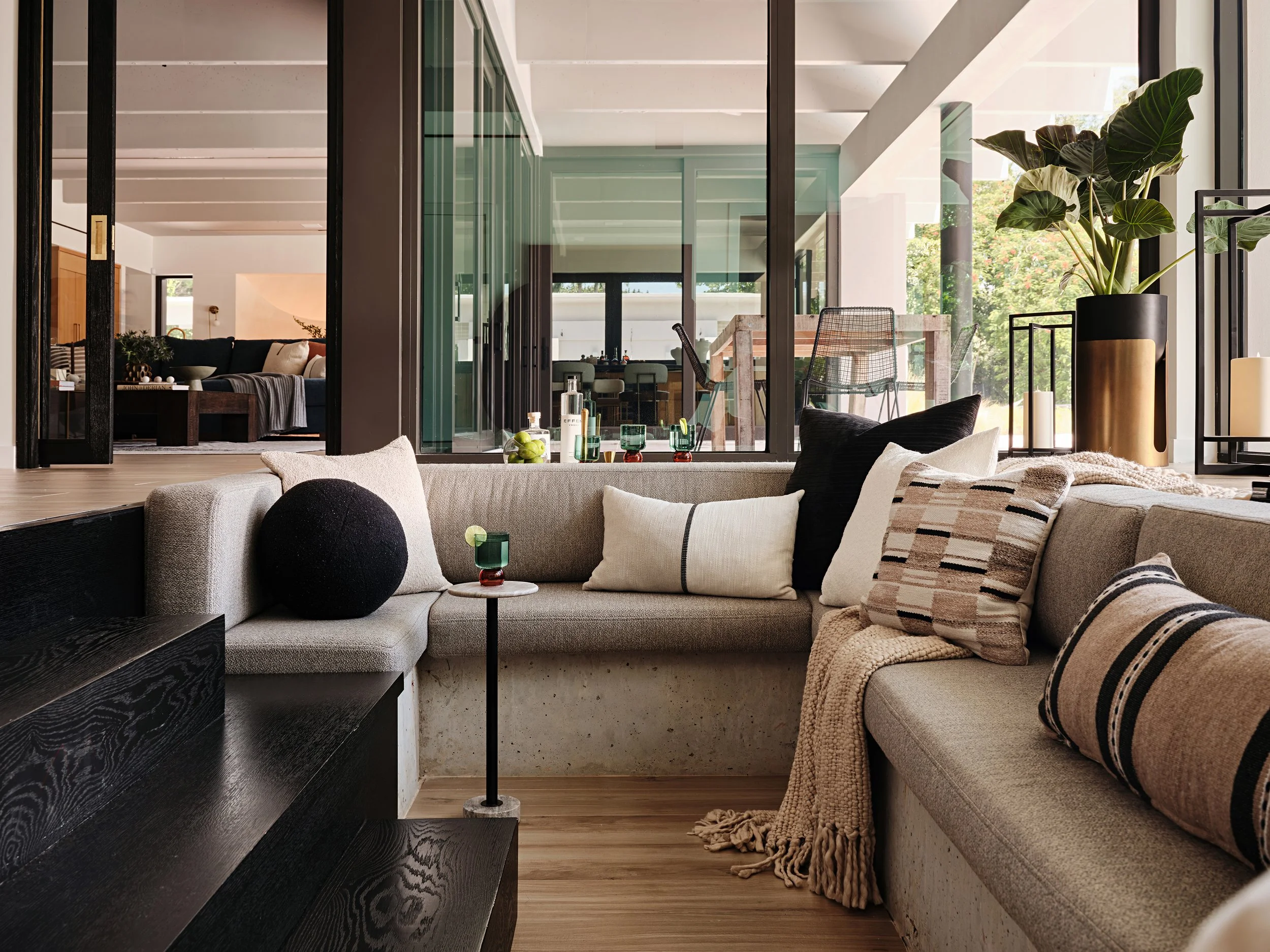 Sunken living room for a new construction home in South Florida. Interior design by Concept 2 Design.